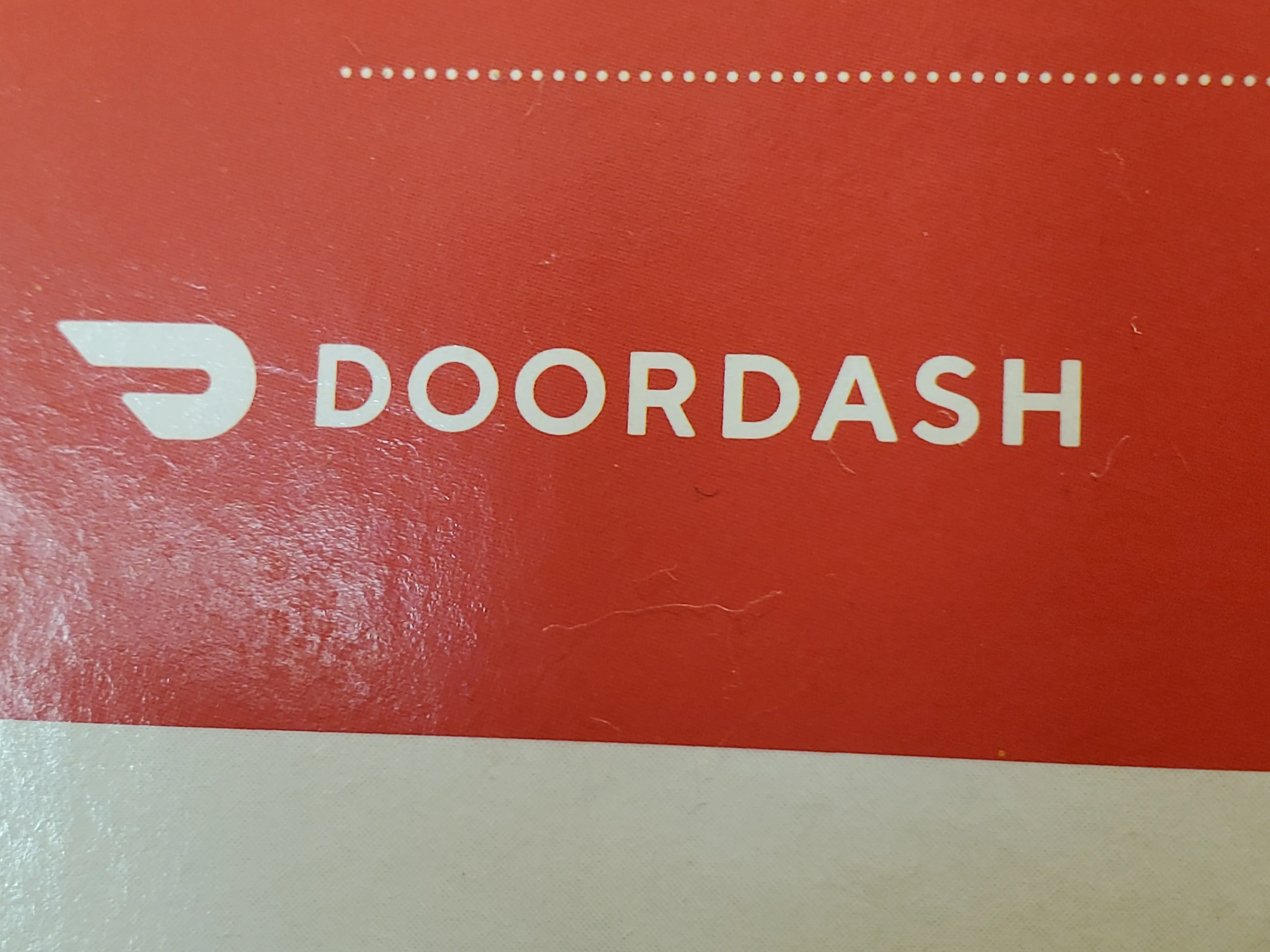 DoorDash confirmed that the driver has been banned from the platform (Image via Getty)
