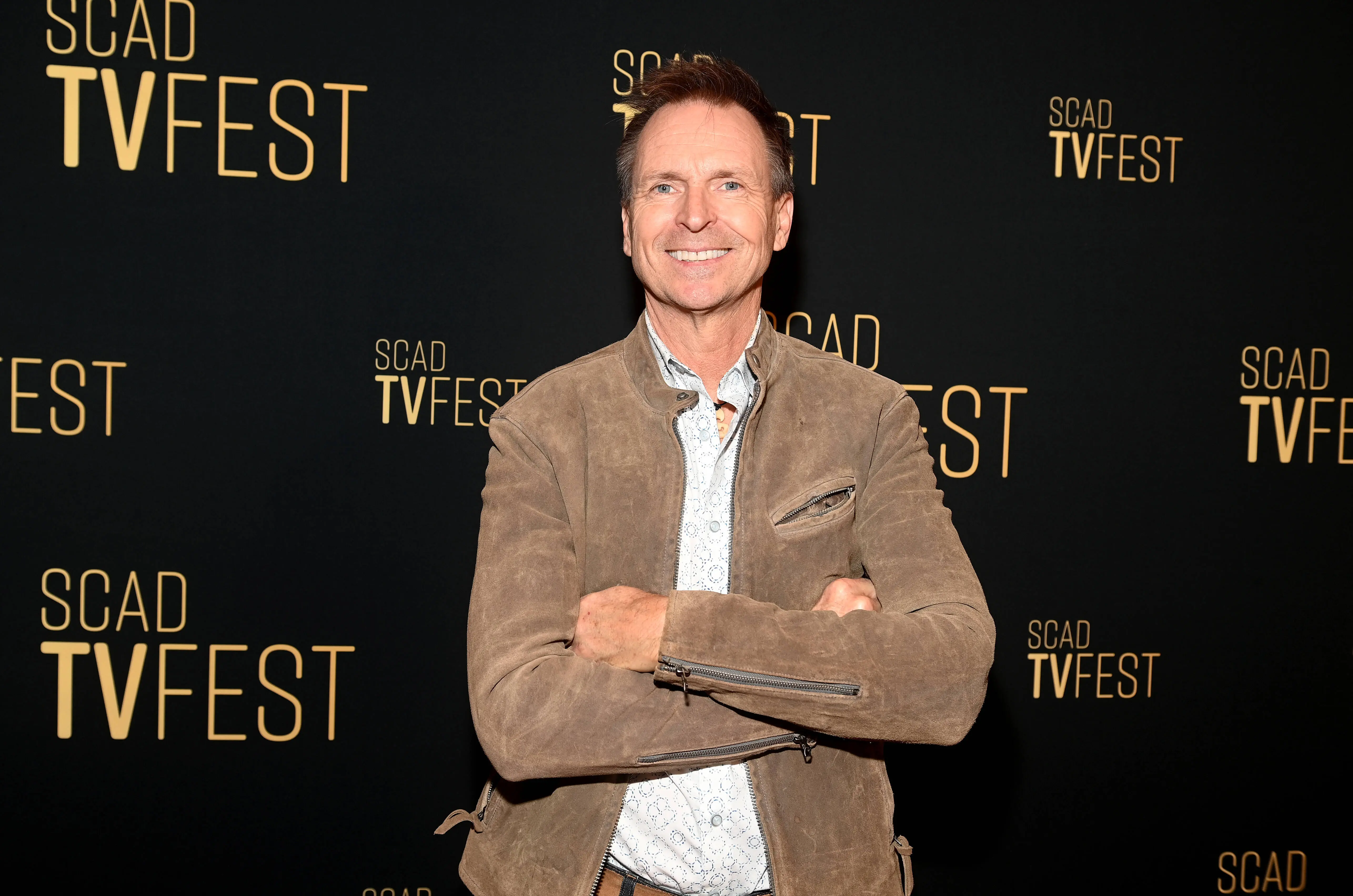Phil Keoghan, host of The Amazing Race (Image via Getty)