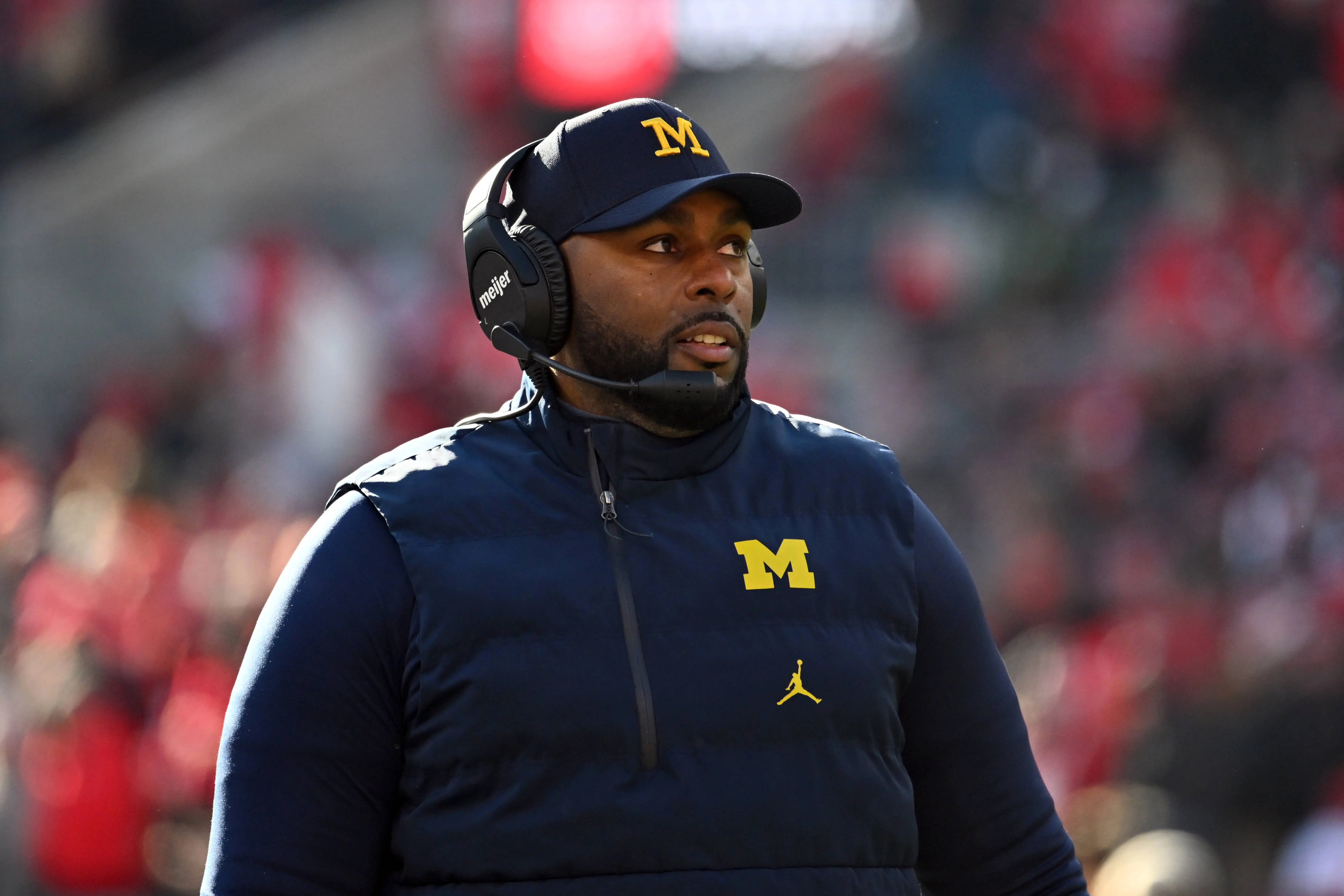 COLUMBUS, OHIO - NOVEMBER 30: Head coach Sherrone Moore of the Michigan Wolverines stands during a timeout in the third quarter of a game against the Ohio State Buckeyes at Ohio Stadium on November 30, 2024 in Columbus, Ohio. (Photo by Ben Jackson/Getty Images)