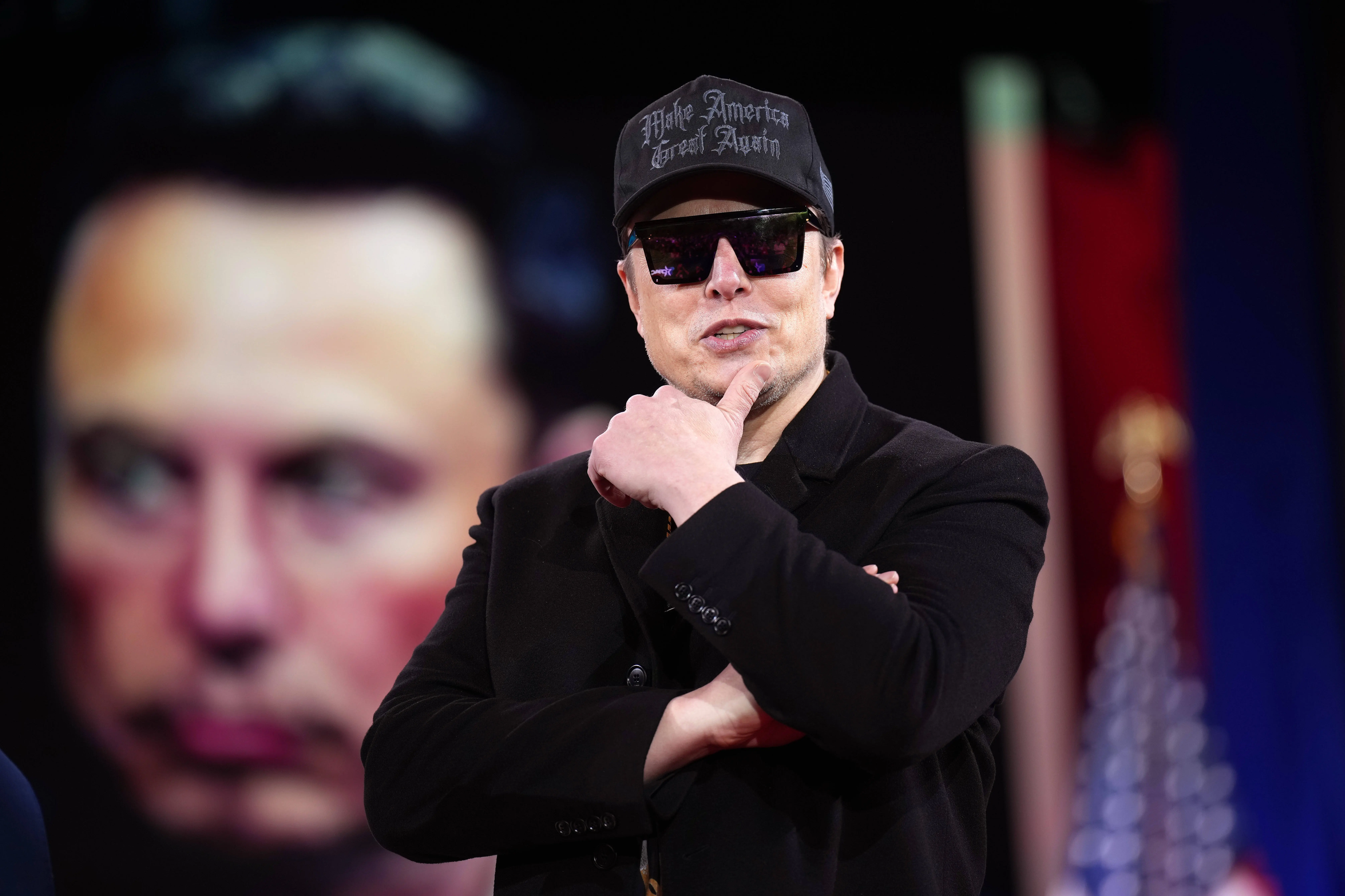 OXON HILL, MARYLAND - FEBRUARY 20: CEO of Tesla and SpaceX Elon Musk speaks at the Conservative Political Action Conference (CPAC) at the Gaylord National Resort Hotel And Convention Center on February 20, 2025 in Oxon Hill, Maryland. The annual four-day gathering brings together conservative U.S. lawmakers, international leaders, media personalities and businessmen to discuss and champion conservative ideas. (Photo by Andrew Harnik/Getty Images)