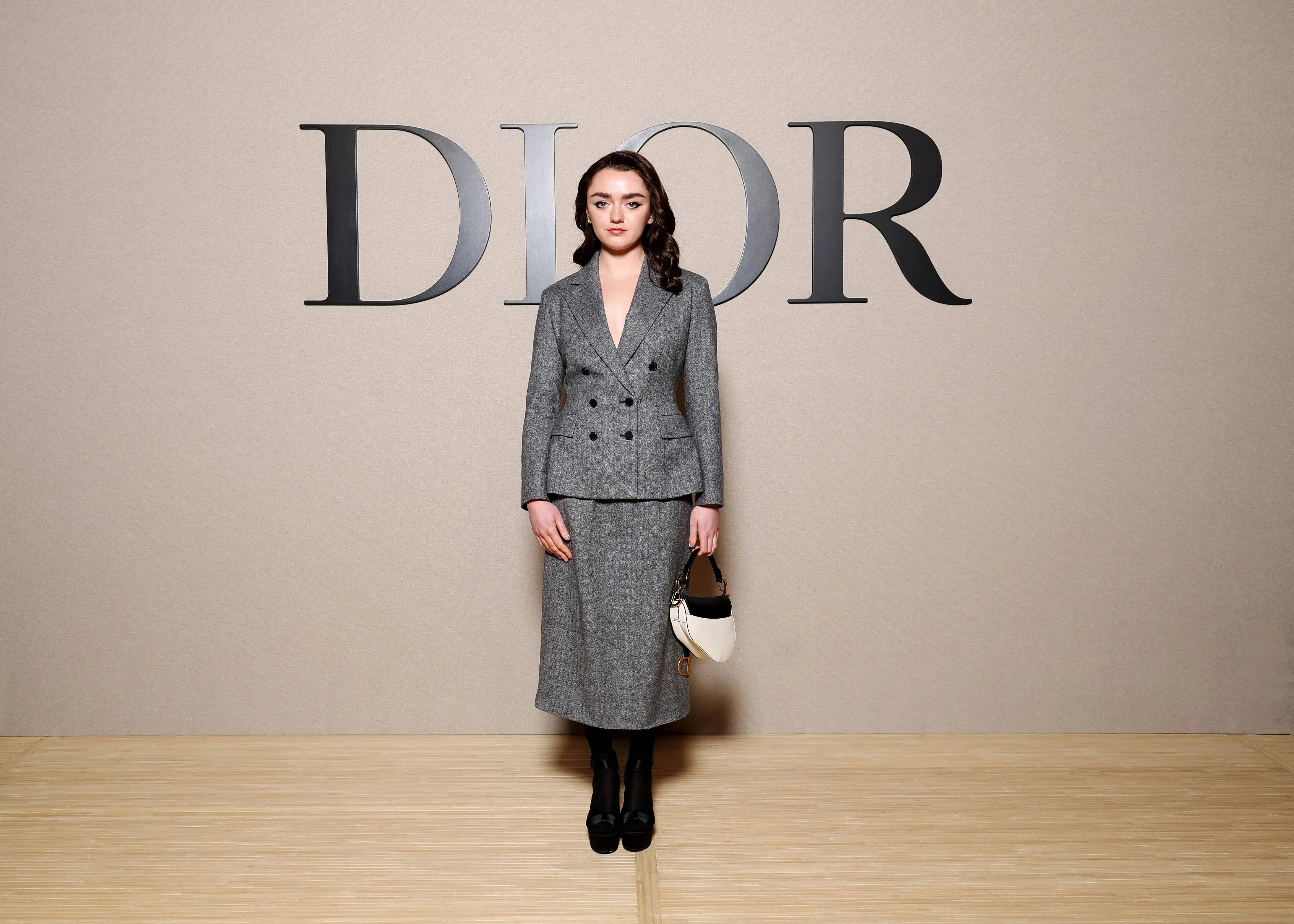 PARIS, FRANCE - FEBRUARY 27: (EDITOR’S NOTE: Image has been retouched at the request of the client.) Maisie Williams attends the Christian Dior Womenswear Fall/Winter 2024-2025 show as part of Paris Fashion Week on February 27, 2024 in Paris, France. (Photo by Pascal Le Segretain/WireImage for Christian Dior)