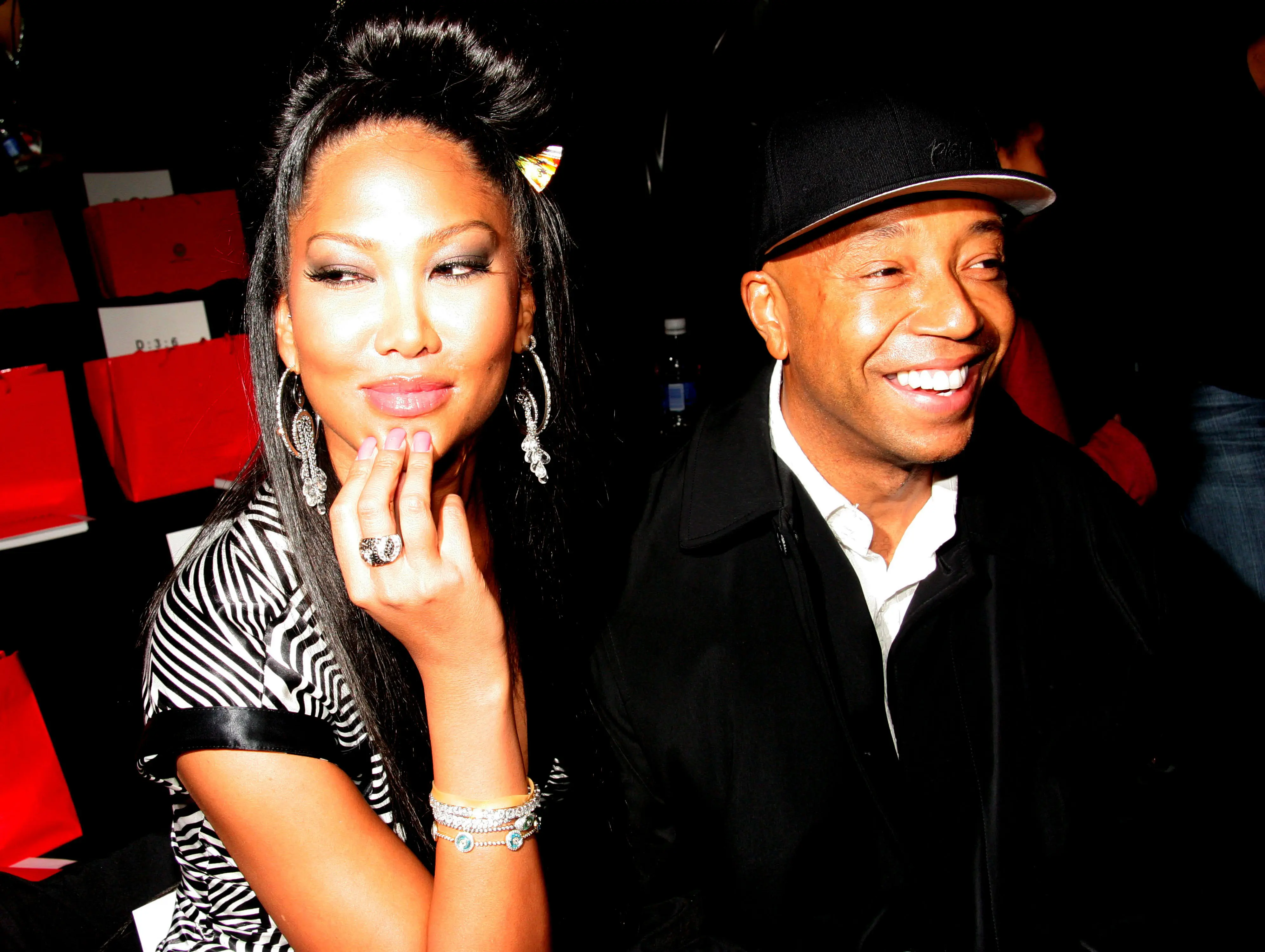 Kimora Lee Simmons and Russell Simmons during Olympus Fashion Week Fall 2006 - Baby Phat - Front Row and Backstage at Bryant Park in New York City, New York, United States. (Photo by Johnny Nunez/WireImage)