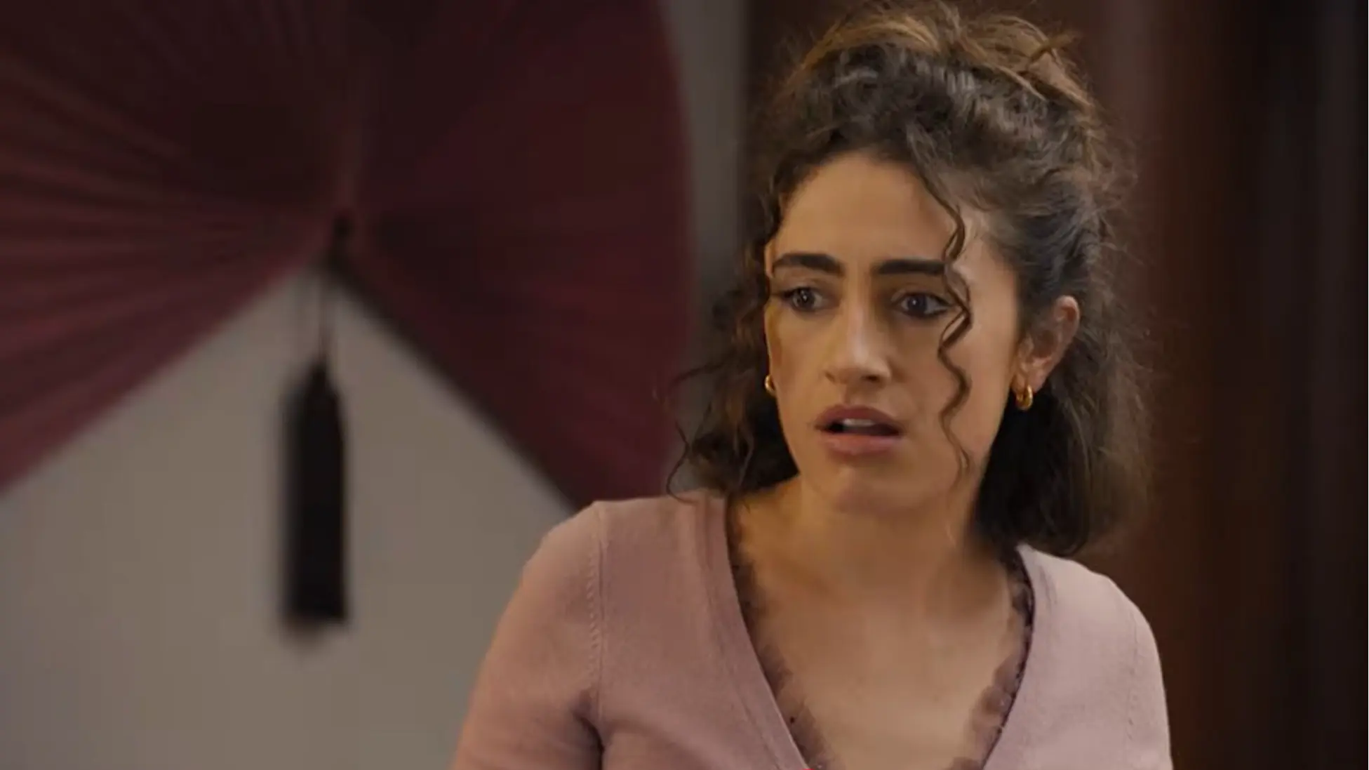 Rachel Sennott as Maia stares ahead in shock as her day unravels, moments before the fallout that costs her everything. Image via Youtube/@HBO Max