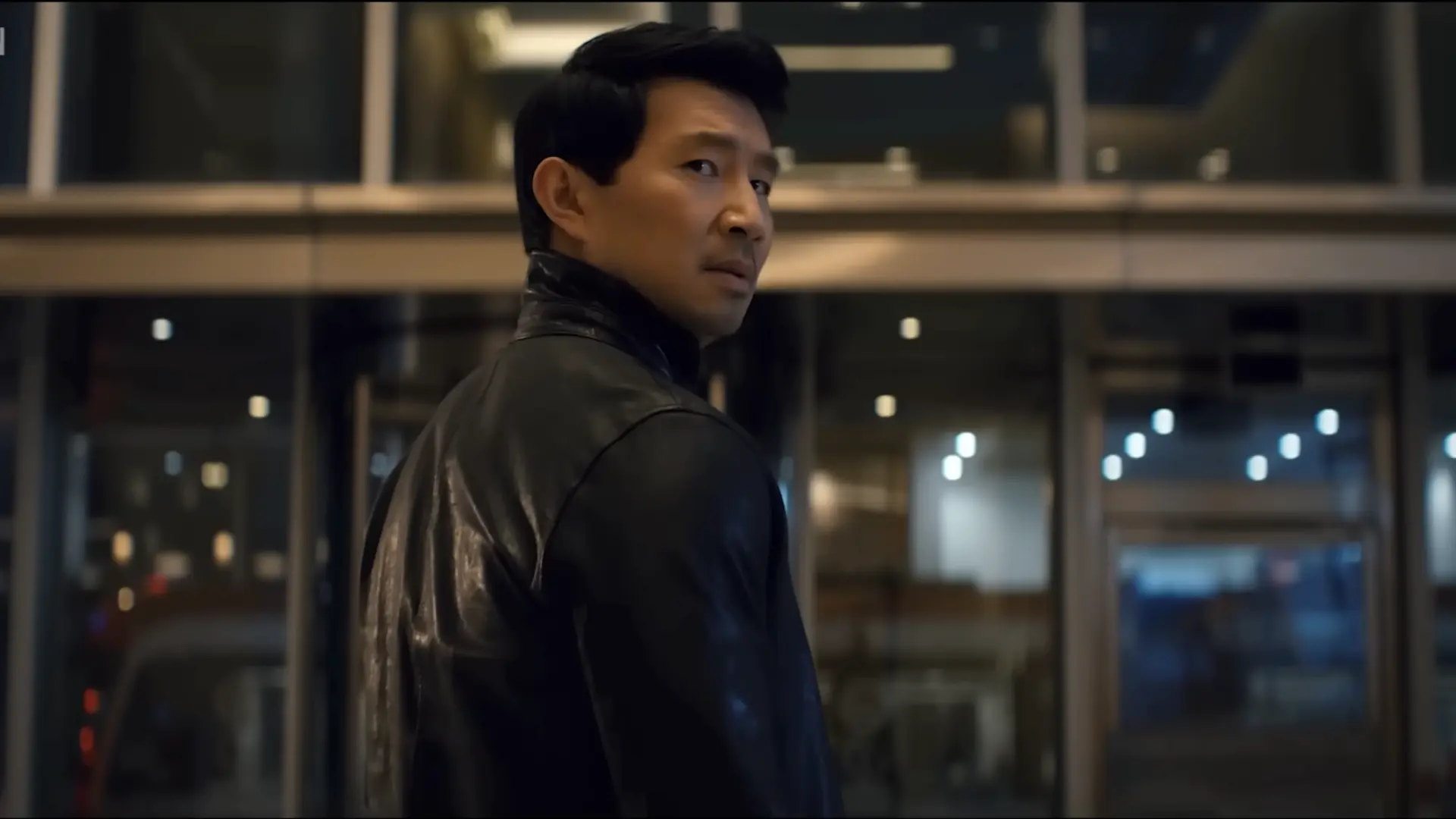 Simu Liu in The Copenhagen Test (Image via YouTube/Peacock)