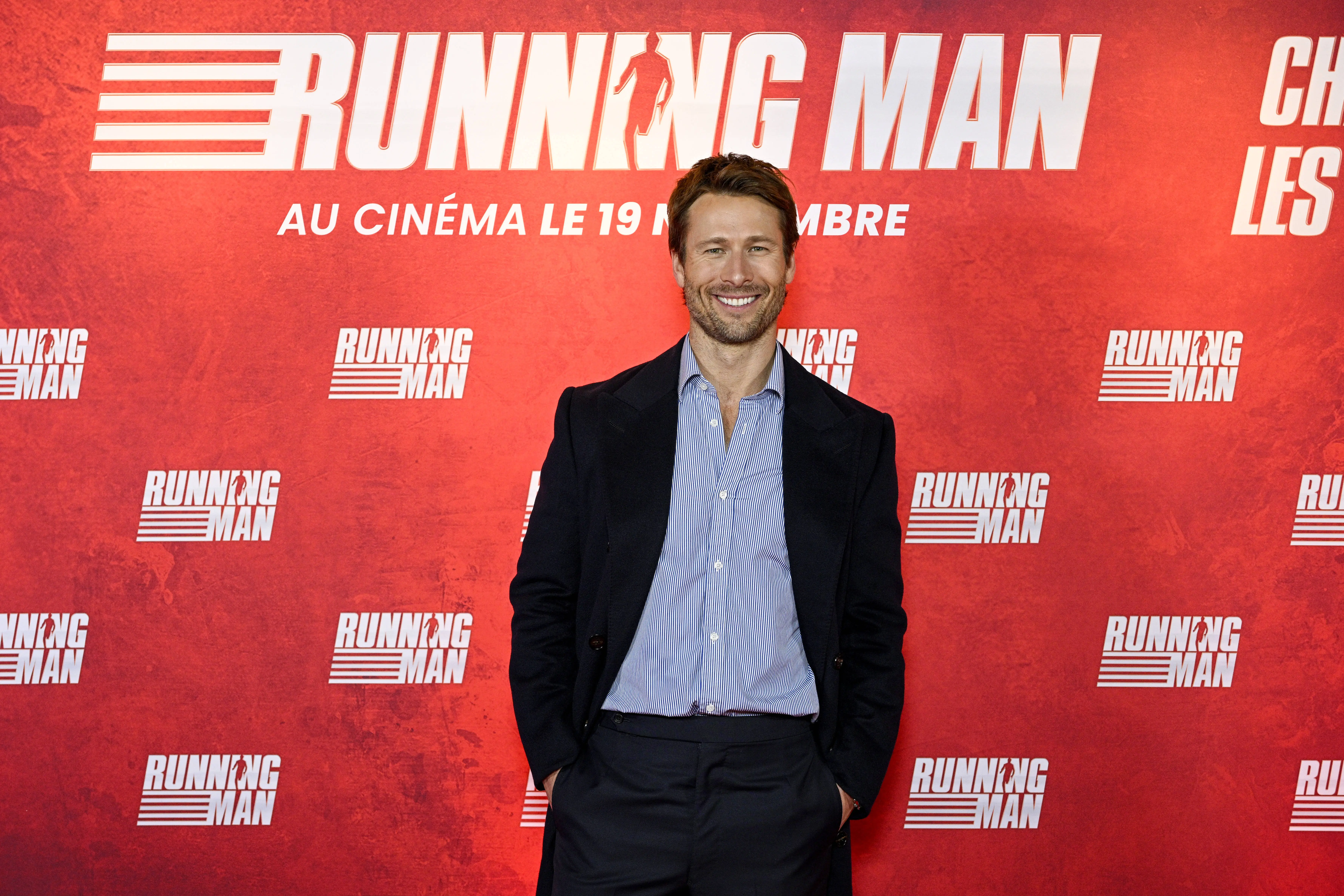 PARIS, FRANCE - NOVEMBER 03: Glen Powell attends the "Running Man" – Paris Special Screening at UGC Cine Cite Bercy on November 03, 2025 in Paris, France. (Photo by Kristy Sparow/Getty Images For Paramount)