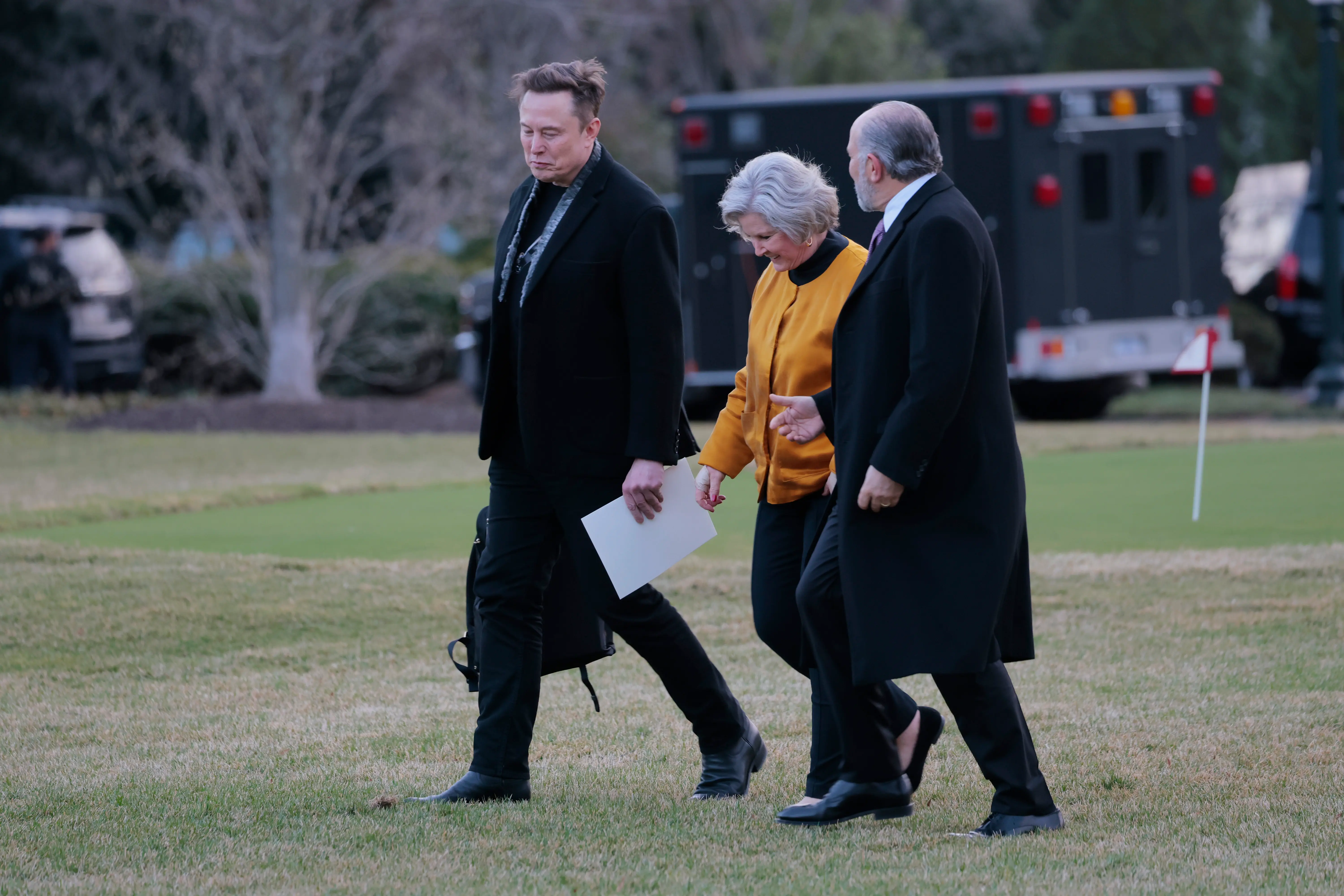 WASHINGTON, DC - MARCH 07: (L-R) White House Senior Advisor to the President, Tesla and SpaceX CEO Elon Musk, White House Chief of Staff Susie Wiles and U.S. Commerce Secretary Howard Lutnick watch as U.S. President Donald Trump's walks to Marine One at the White House on March 07, 2025 in Washington, DC. Trump is traveling to Mar-a-lago in Palm Beach, Florida. (Photo by Anna Moneymaker/Getty Images)
