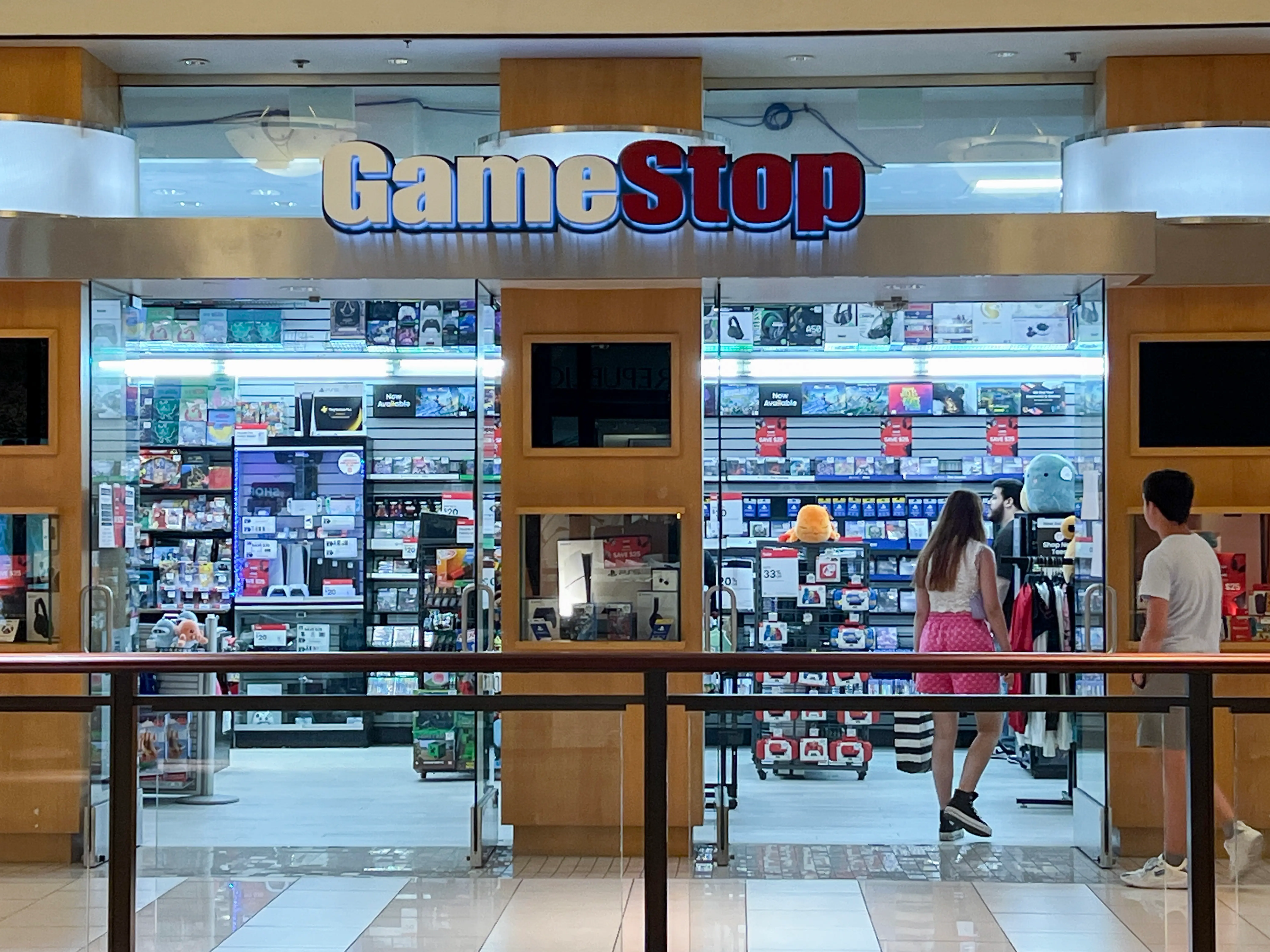 MIAMI, FLORIDA - MAY 28: Merchandise lines the shelves of a GameStop store on May 28, 2024 in Miami, Florida. GameStop stock jumped higher after the video game retailer announced that it had raised $933 million by selling 45 million common shares of its stock earlier this month. (Photo by Joe Raedle/Getty Images)