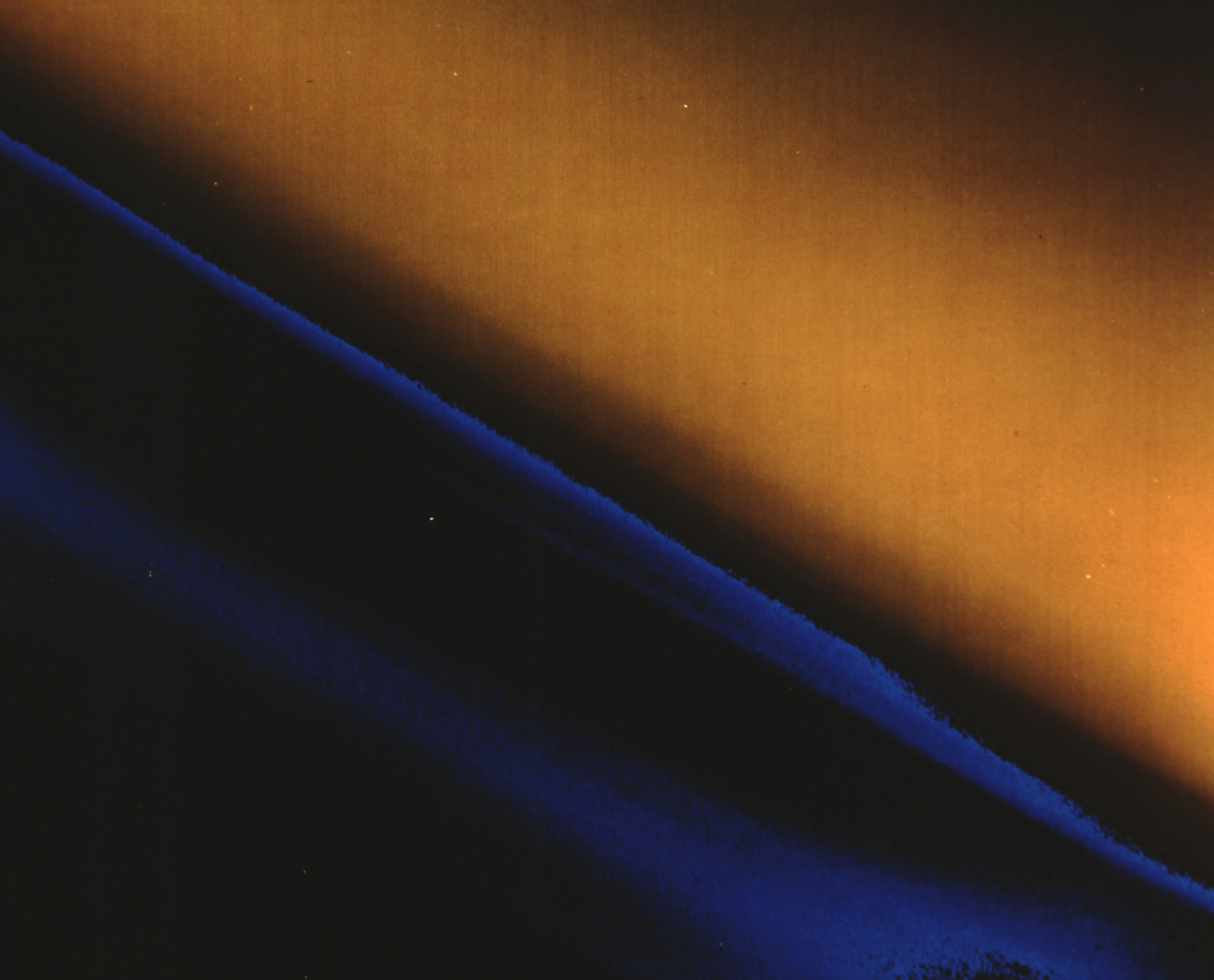 Closeup of Titan, moon of the planet Saturn, 22, 000 kilometer range, from the spacecraft Voyager 1, November 12, 1980. (Image via Getty)