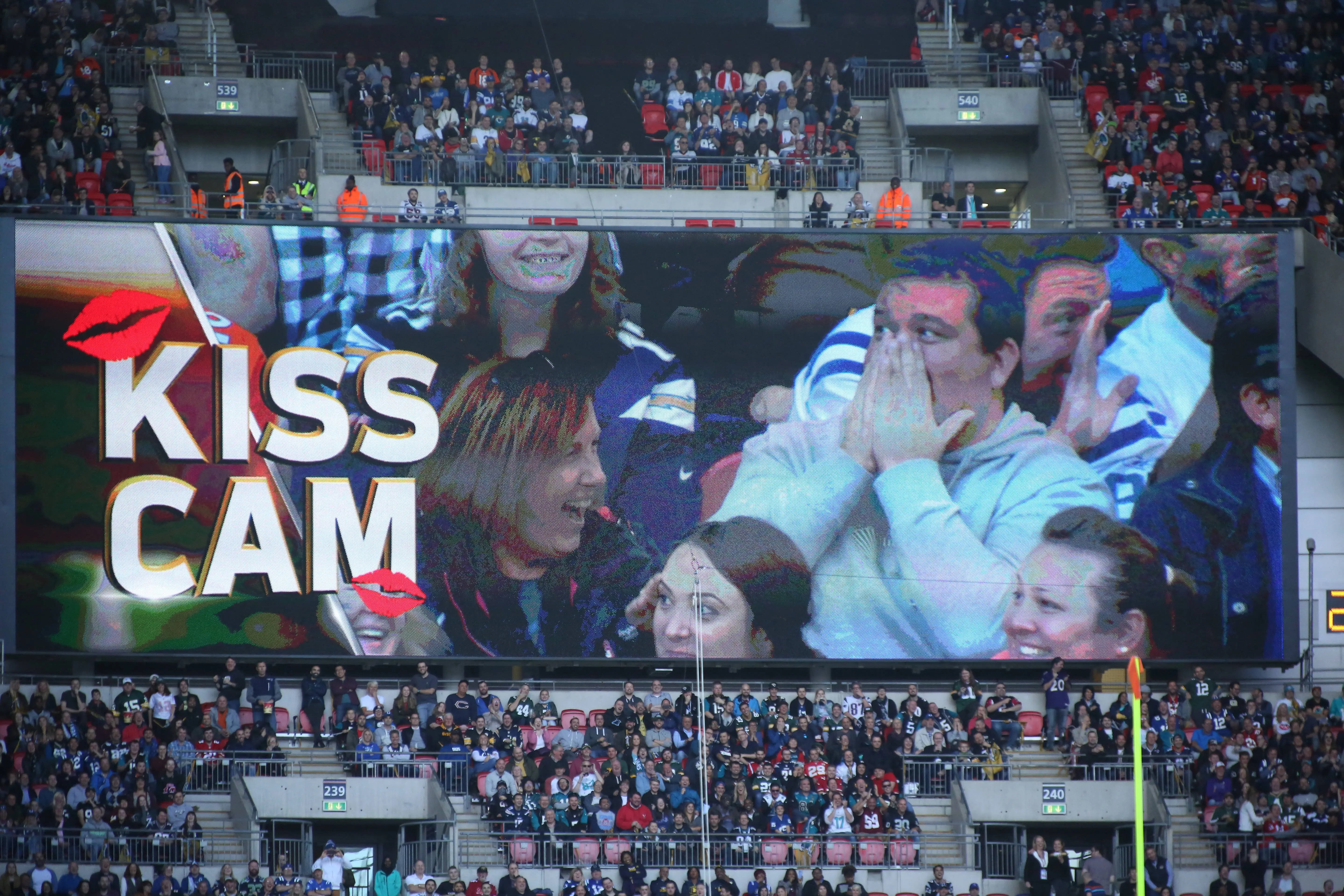 October 2, 2016:  Fans on the Kiss Cam on the Jumbotron during the Jacksonville Jaguars versus the Indianapolis Colts International Series game at Wembley Stadium in London, England, UK. (Photo by Ricky Swift/Icon Sportswire via Getty Images)