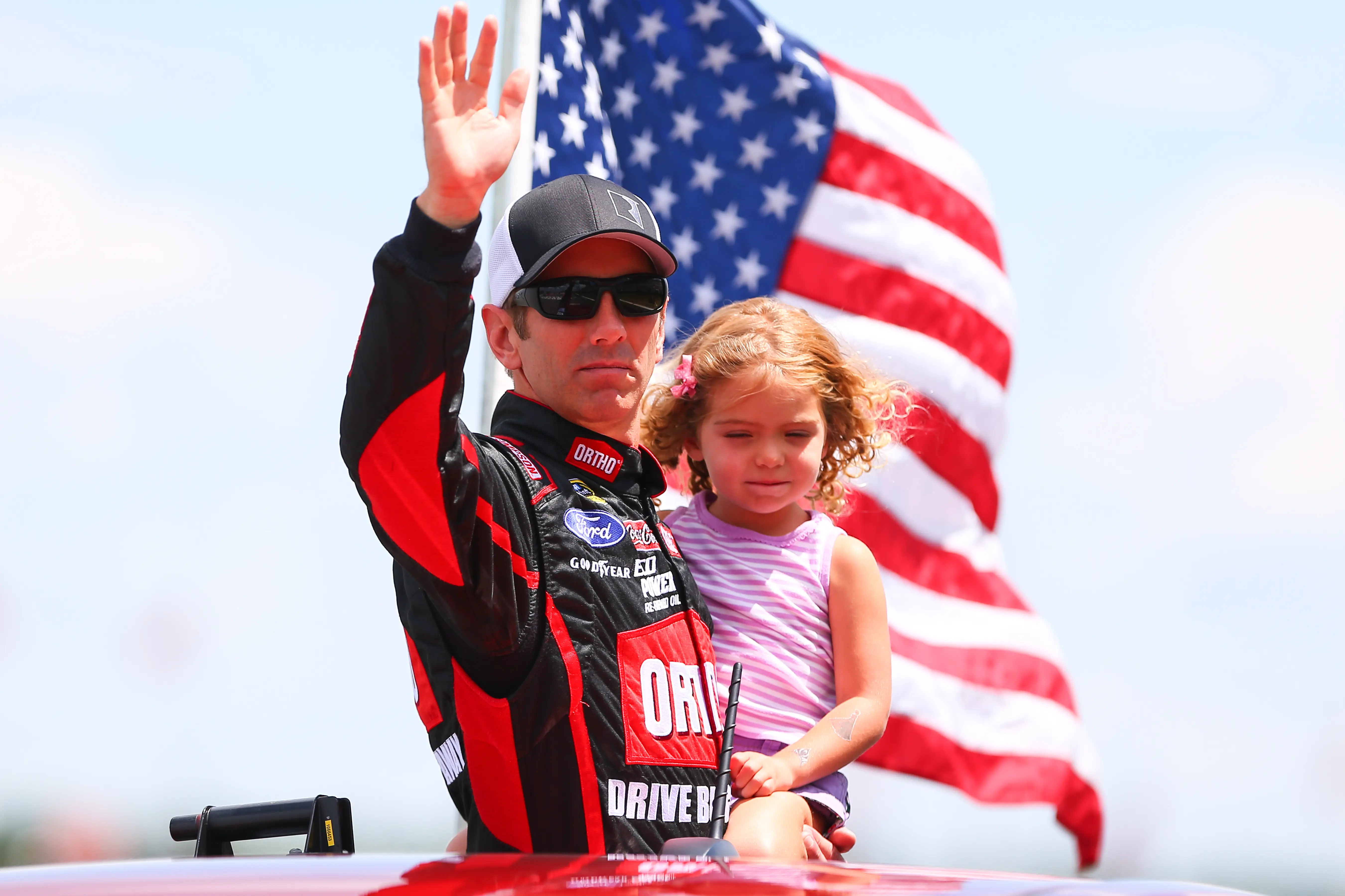 02 AUG 2015: Sprint Cup Series driver Greg Biffle (16) and daughter Emma waves to the crowd prior to the Windows 10 400 at Pocono Raceway in Long Pond,PA. Sprint Cup Series driver Matt Kenseth (20) went on to win the Windows 10 400. (Photo by Rich Graessle/Icon Sportswire/Corbis/Icon Sportswire via Getty Images)