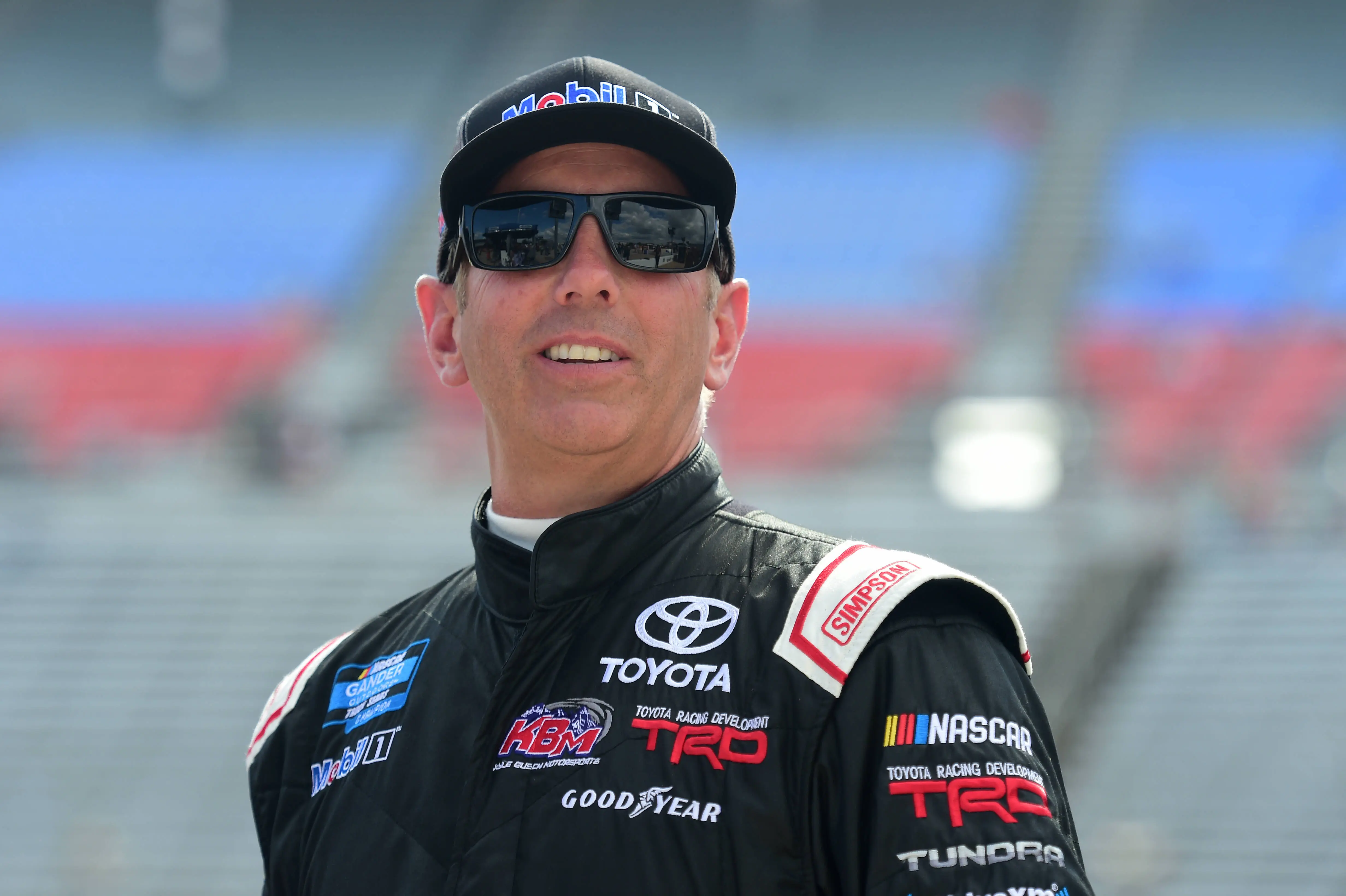 FORT WORTH, TEXAS - JUNE 07: Greg Biffle, driver of the #51 Toyota Toyota, stands on the grid during US Concrete Qualifying Day for the NASCAR Gander Outdoors Truck Series SpeedyCash.com 400 at Texas Motor Speedway on June 07, 2019 in Fort Worth, Texas. (Photo by Jared C. Tilton/Getty Images)
