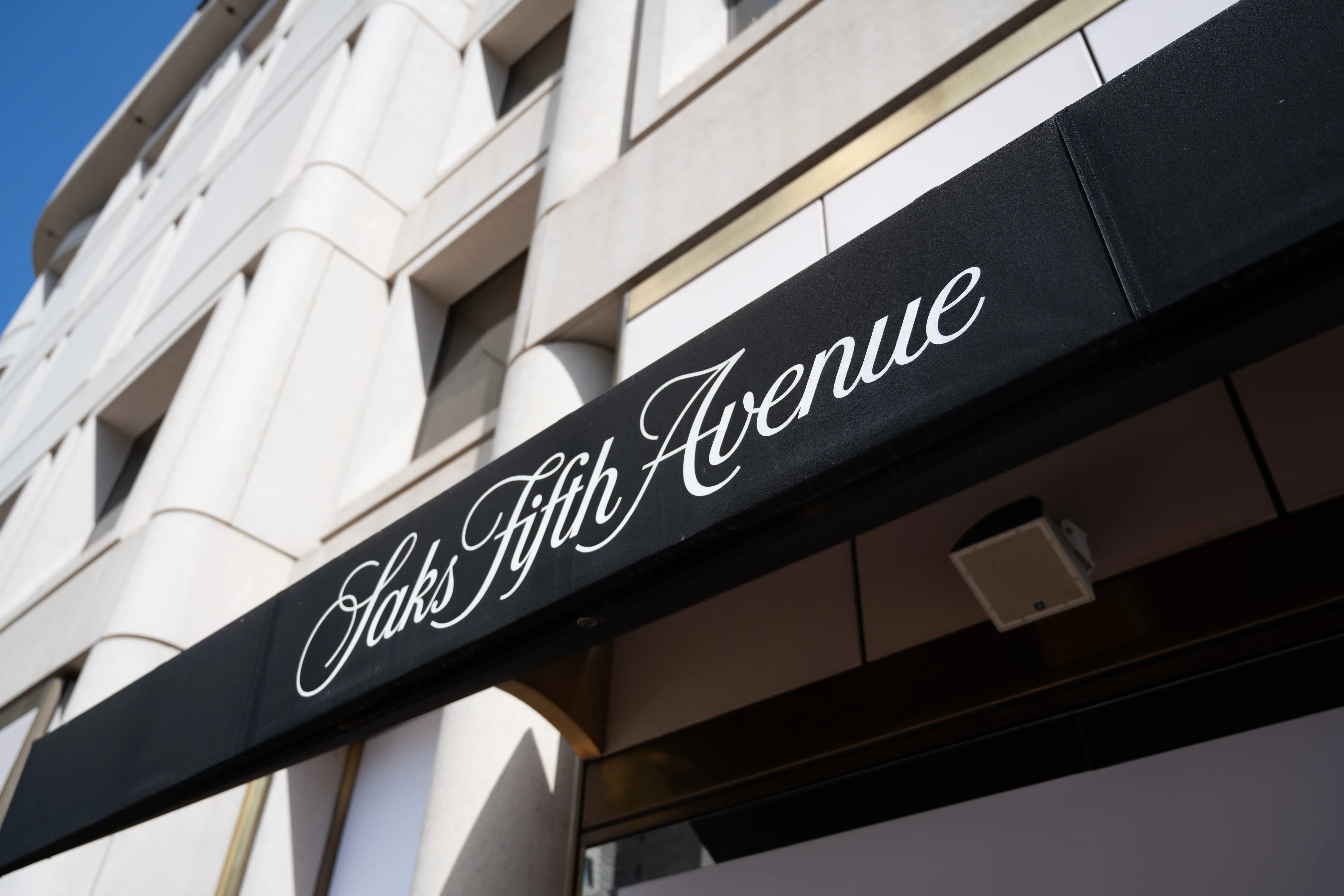 Awning with Saks Fifth Avenue logo outside department store on a clear day, San Francisco, California, May 13, 2025. (Photo by Smith Collection/Gado/Getty Images)