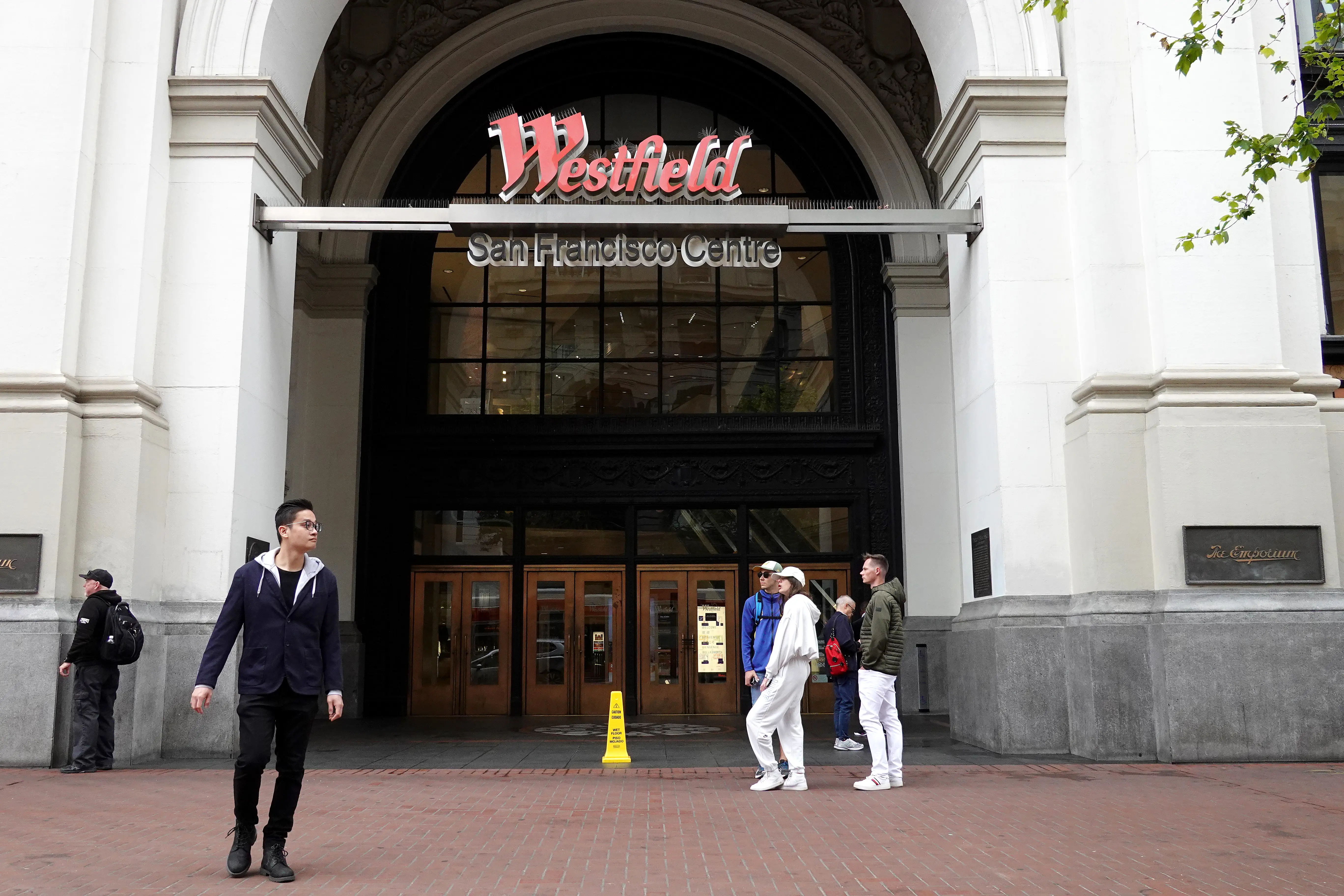 SAN FRANCISCO, CA - JUNE 14: Pedestrians walk by a the Westfield San Francisco Centre on June 14, 2023 in San Francisco, California. San Francisco's downtown continues to struggle with keeping retail and commercial properties rented following the COVID-19 pandemic, and lags behind all major cities in the U.S. and Canada. Westfield has stopped making payments on a $558 million loan for their mall at 865 Market St. weeks after their anchor tenant Nordstrom announced plans to pull out of the mall. Downtown San Francisco has an estimated 18.4 million square feet of available real estate. (Photo by Justin Sullivan/Getty Images)