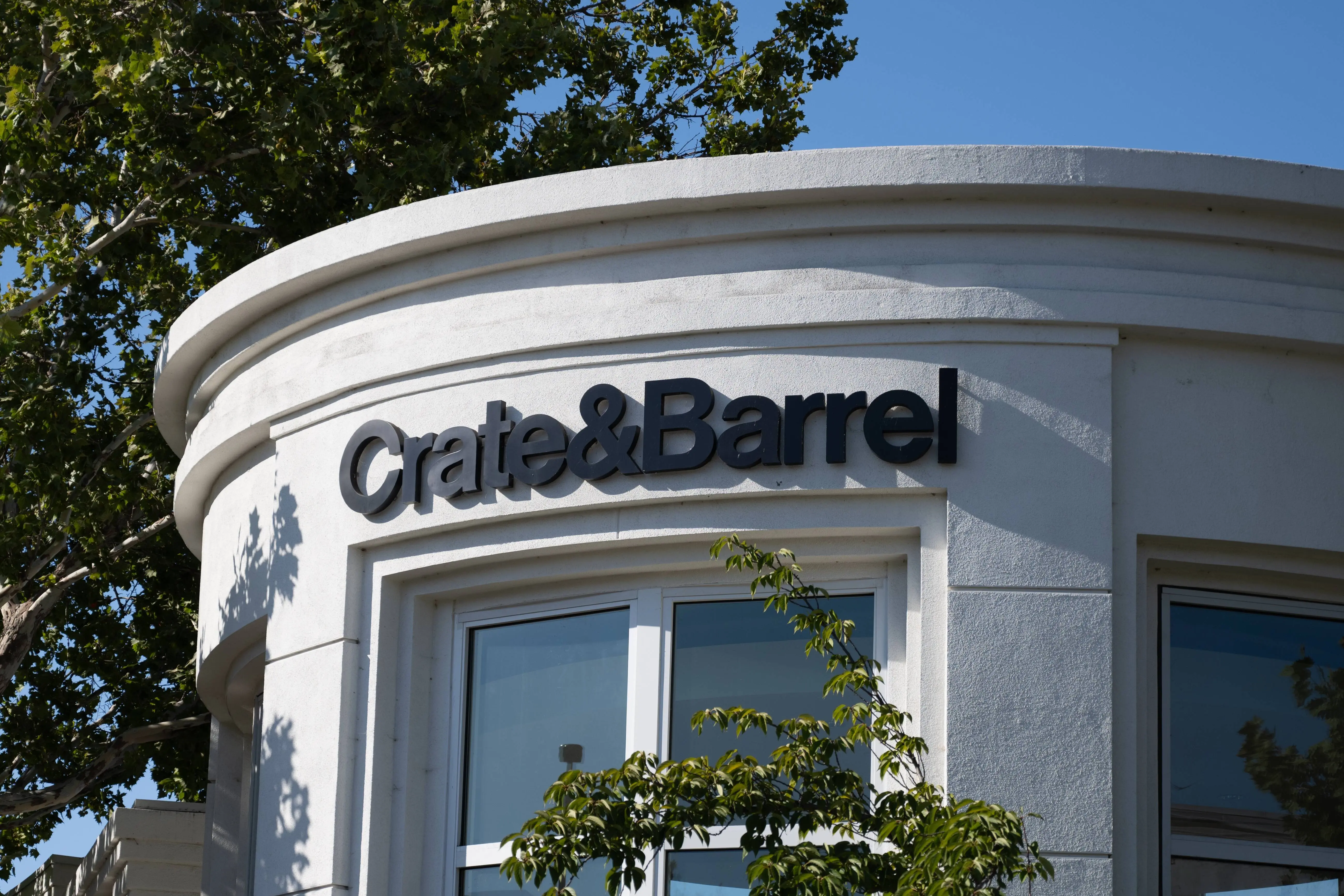 Facade with sign and logo at Crate and Barrel home decor retail store, Walnut Creek, California, August 25, 2025. (Photo by Smith Collection/Gado/Getty Images)