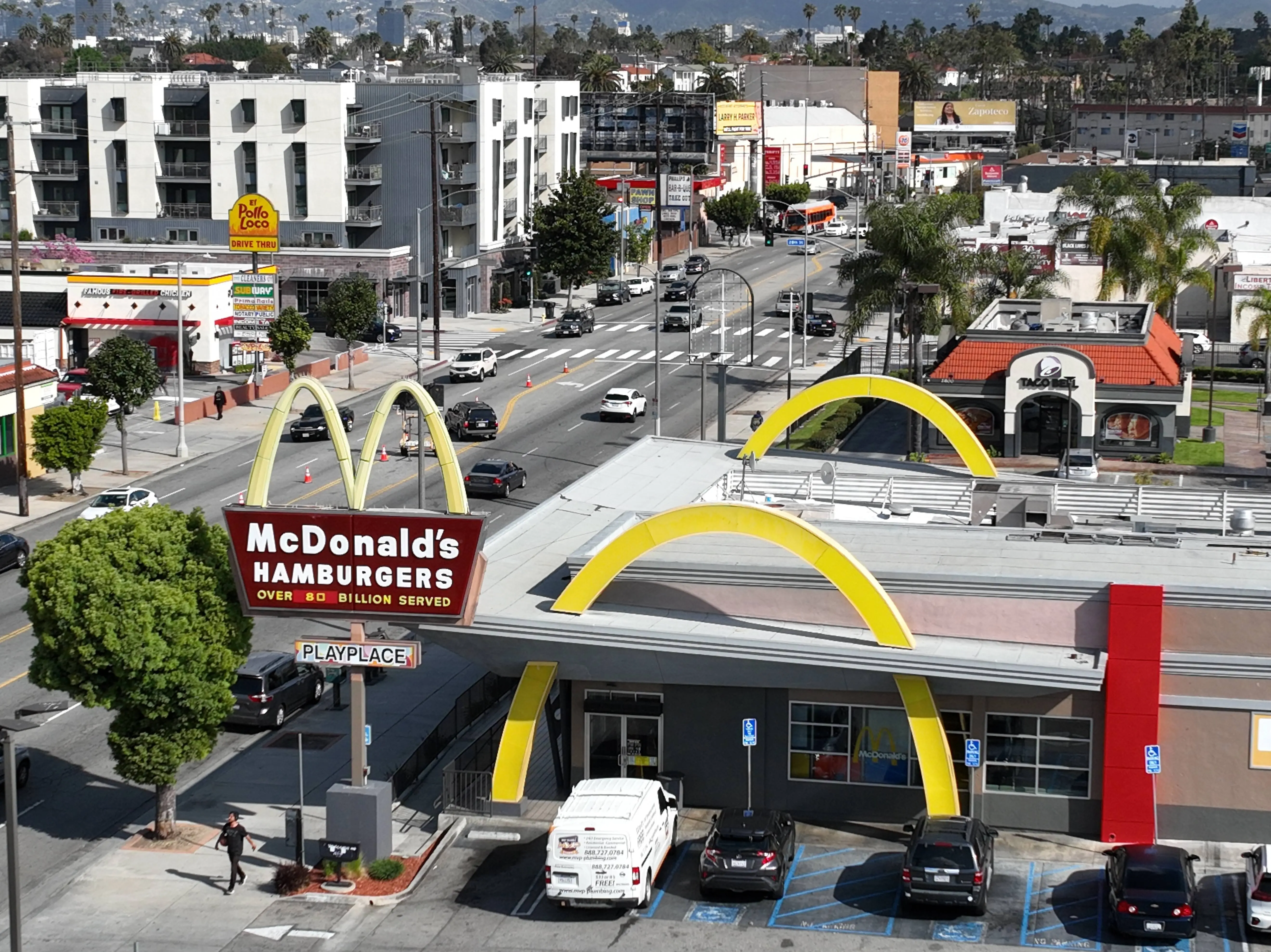 Los Angeles, CA - March 29: An aerial view of fast food restaurants on Crenshaw Blvd including Taco Bell, McDonald's, Yoshinoya, Subway, El Pollo Loco, Little Caesers, Panda Express,Taco Bell, and Smart &amp; Final grocery store. Photo taken in south Los Angeles Friday, March 29, 2024.  (Allen J. Schaben / Los Angeles Times via Getty Images)