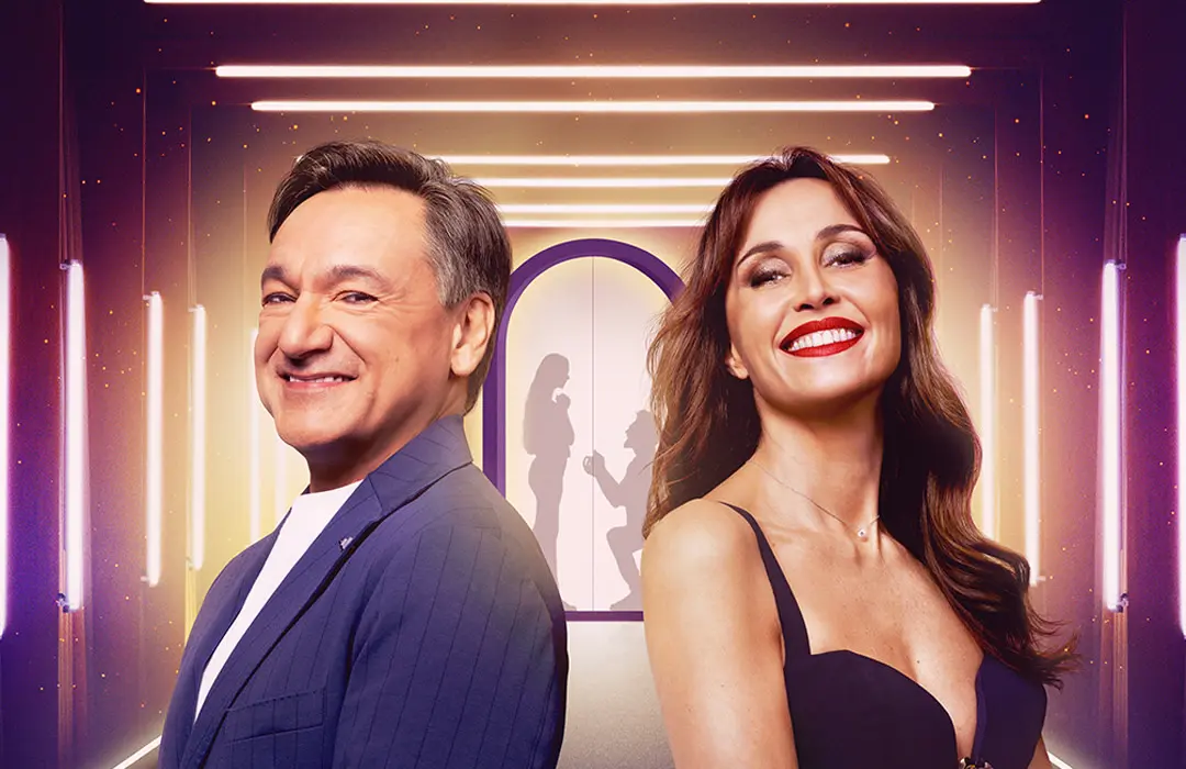Fabio Caressa and Bendetta Parodi, hosts of Love is Blind: Italy (Image via Netflix)
