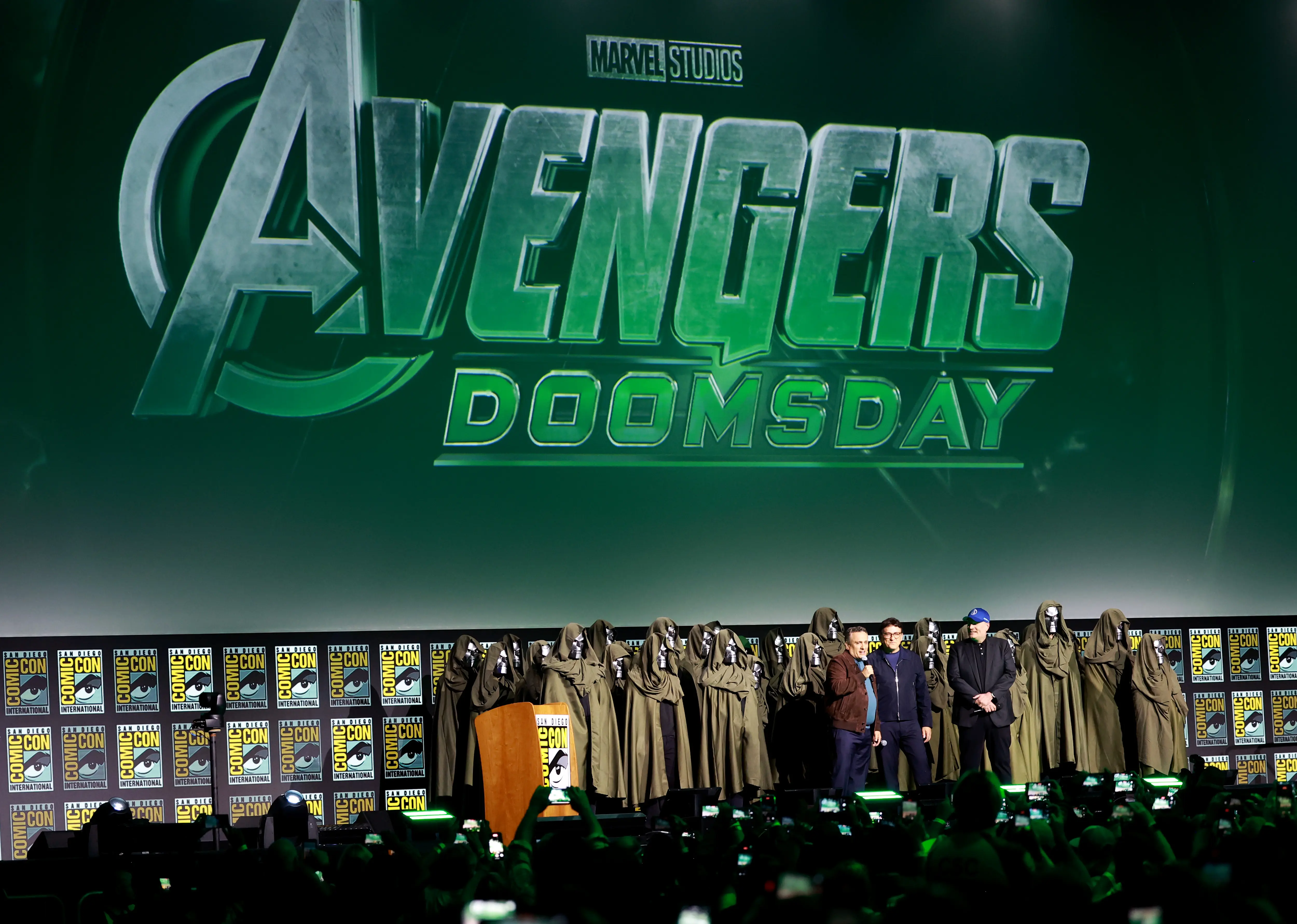 SAN DIEGO, CALIFORNIA - JULY 27: (L-R) Joe Russo, Anthony Russo and Kevin Feige, President, Marvel Studios speak onstage at the Marvel Studios Panel during 2024 Comic-Con International at San Diego Convention Center on July 27, 2024 in San Diego, California.  (Photo by Matt Winkelmeyer/Getty Images)