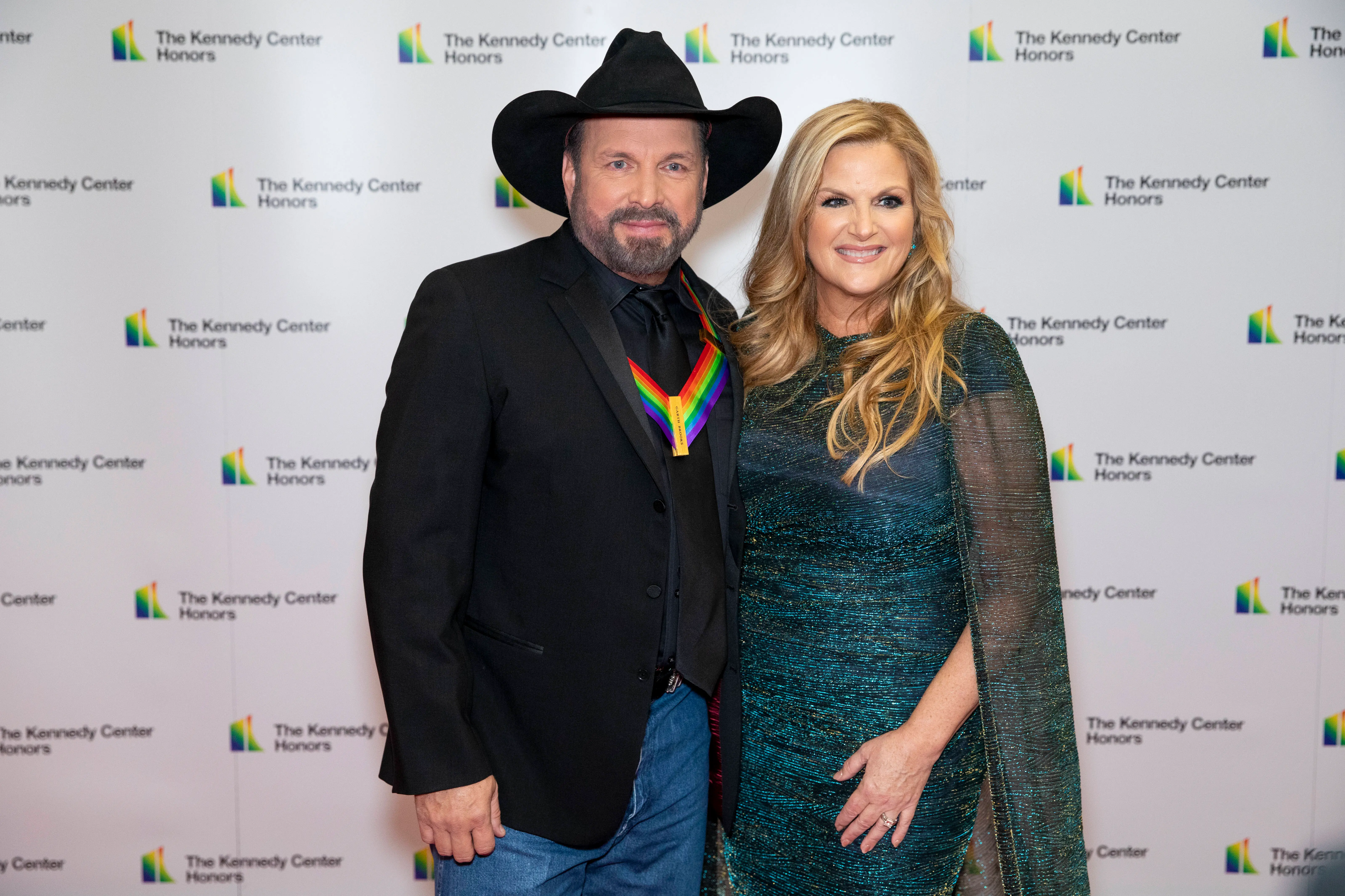 Garth Brooks and Trisha Yearwood arrive on the red carpet of a dinner with Kennedy Center honorees, lawmakers and other special guests at the State Department in Washington, D.C. on December 3, 2022. (Amanda Andrade-Rhoades/For The Washington Post via Getty Images)