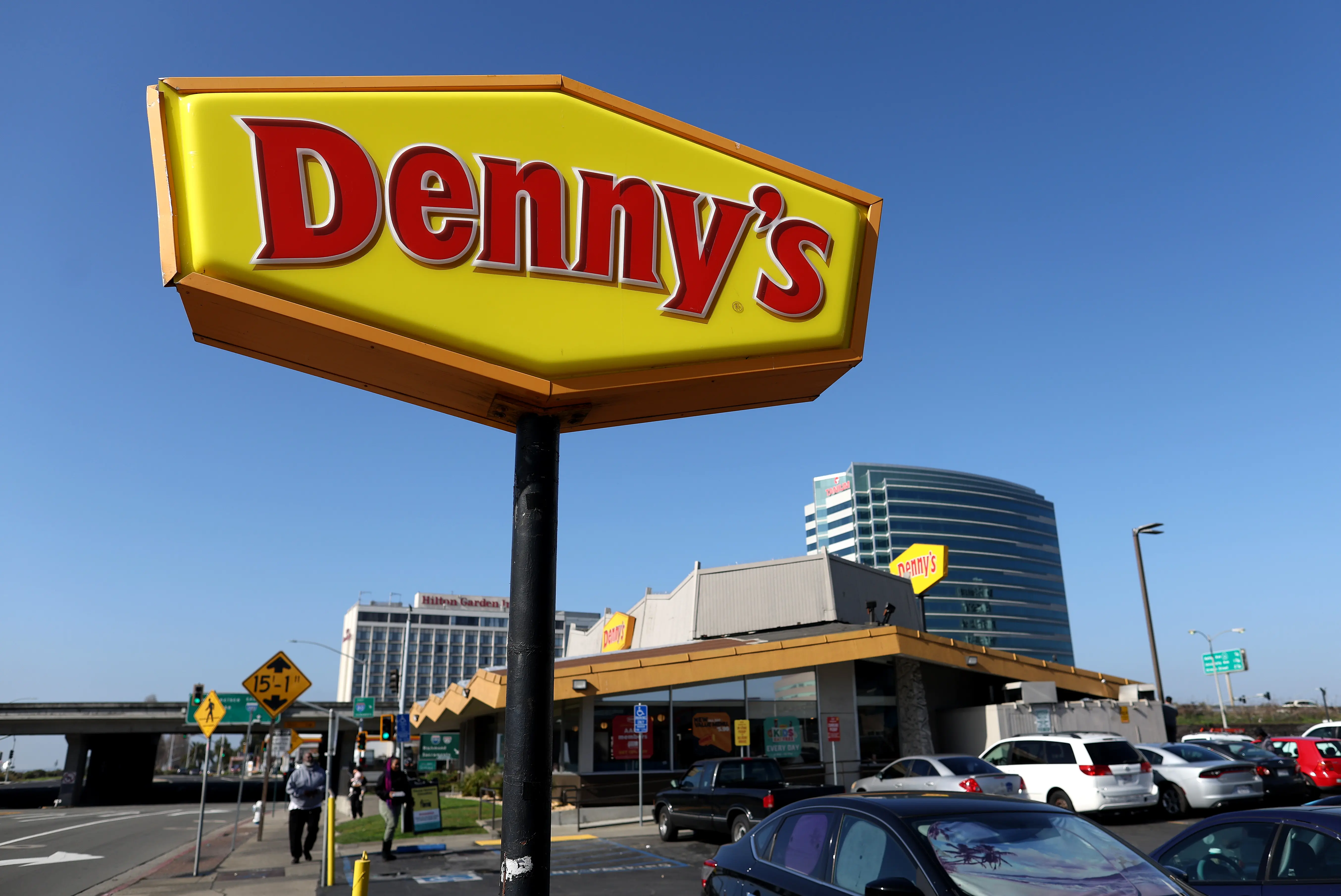 A sign is posted in front of a Denny's restaurant on February 13, 2023 in Emeryville, California. Denny's restaurant will report fourth quarter earnings today after the closing bell. (Photo by Justin Sullivan/Getty Images)