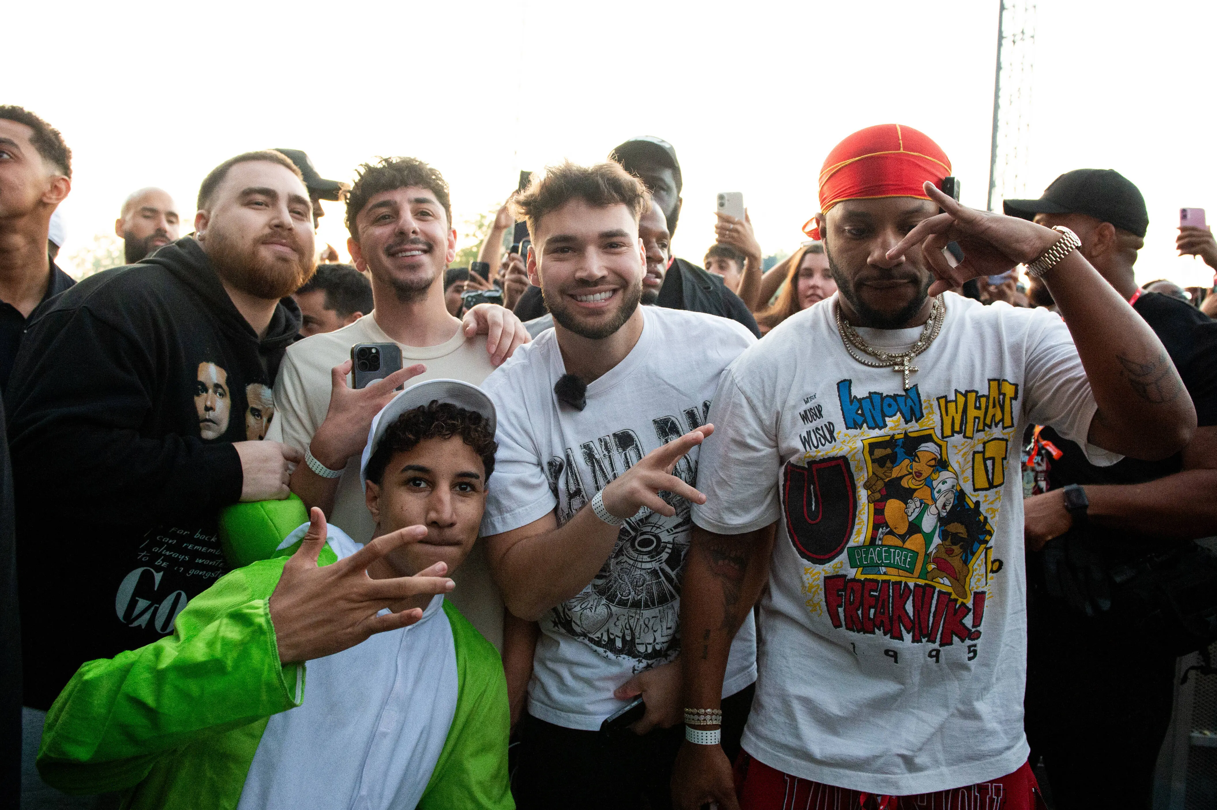 LONDON, ENGLAND - JULY 11: (EDITORIAL USE ONLY) FaZe Rug (2L) and Adin Ross (C) attend Wireless Festival at Finsbury Park on July 11, 2025 in London, England. (Photo by Joseph Okpako/WireImage)