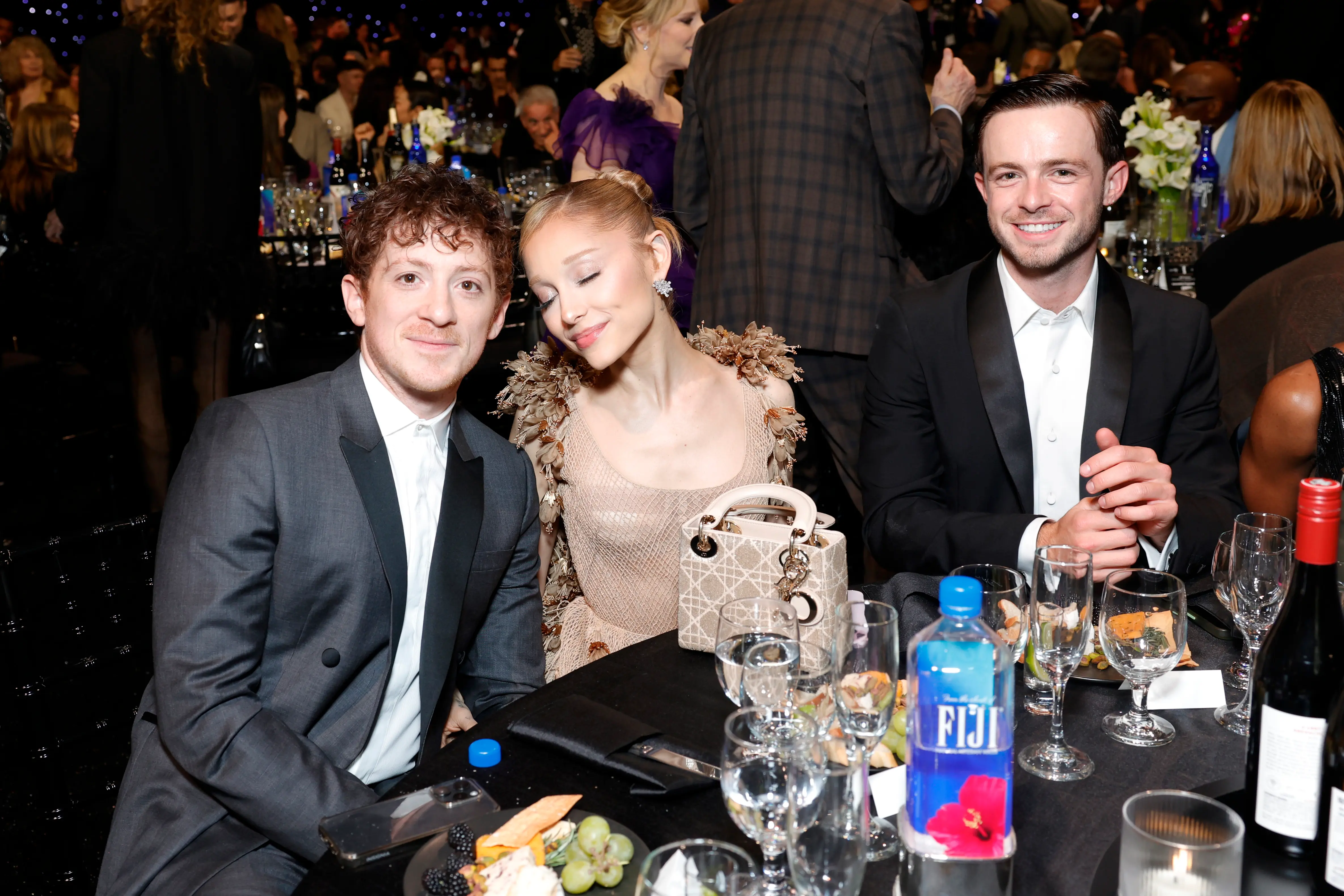 (L-R) Ethan Slater, Ariana Grande and a guest attend FIJI Water at The 30th Critics Choice Awards at Barker Hangar on February 07, 2025 in Santa Monica, California. (Photo by Stefanie Keenan/Getty Images for FIJI Water)
