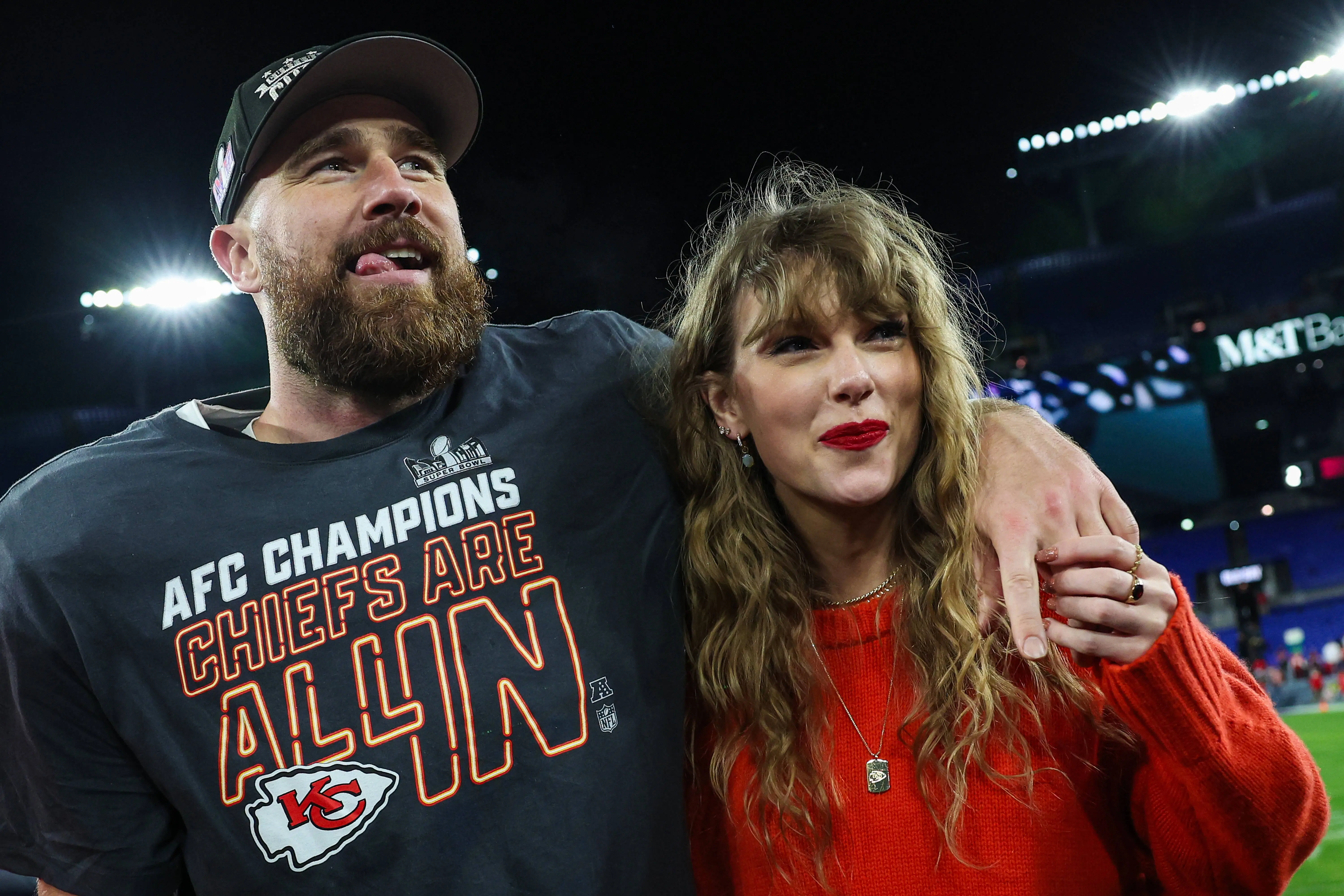 Travis Kelce #87 of the Kansas City Chiefs (L) celebrates with Taylor Swift after defeating the Baltimore Ravens in the AFC Championship Game at M&amp;T Bank Stadium on January 28, 2024 in Baltimore, Maryland.  (Photo by Patrick Smith/Getty Images)