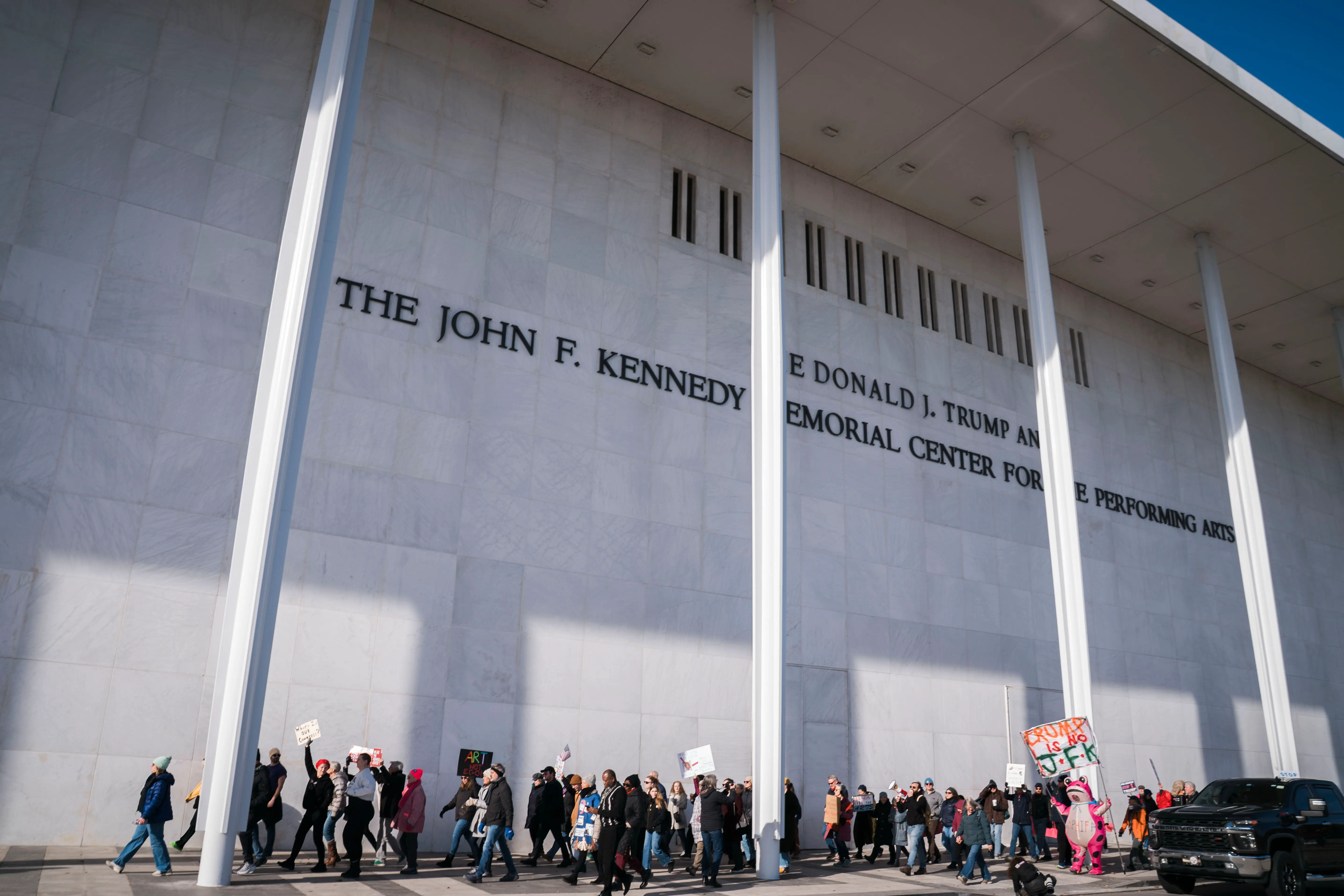 WASHINGTON,DC - DECEMBER 20: Protesters gather in front of the The John F. Kennedy Center for the Performing Arts after President Donald Trump's name was added to the facade on Dec.20, 2025 in Washington, DC. Photo by Maxine Wallace/The Washington Post via Getty Images)