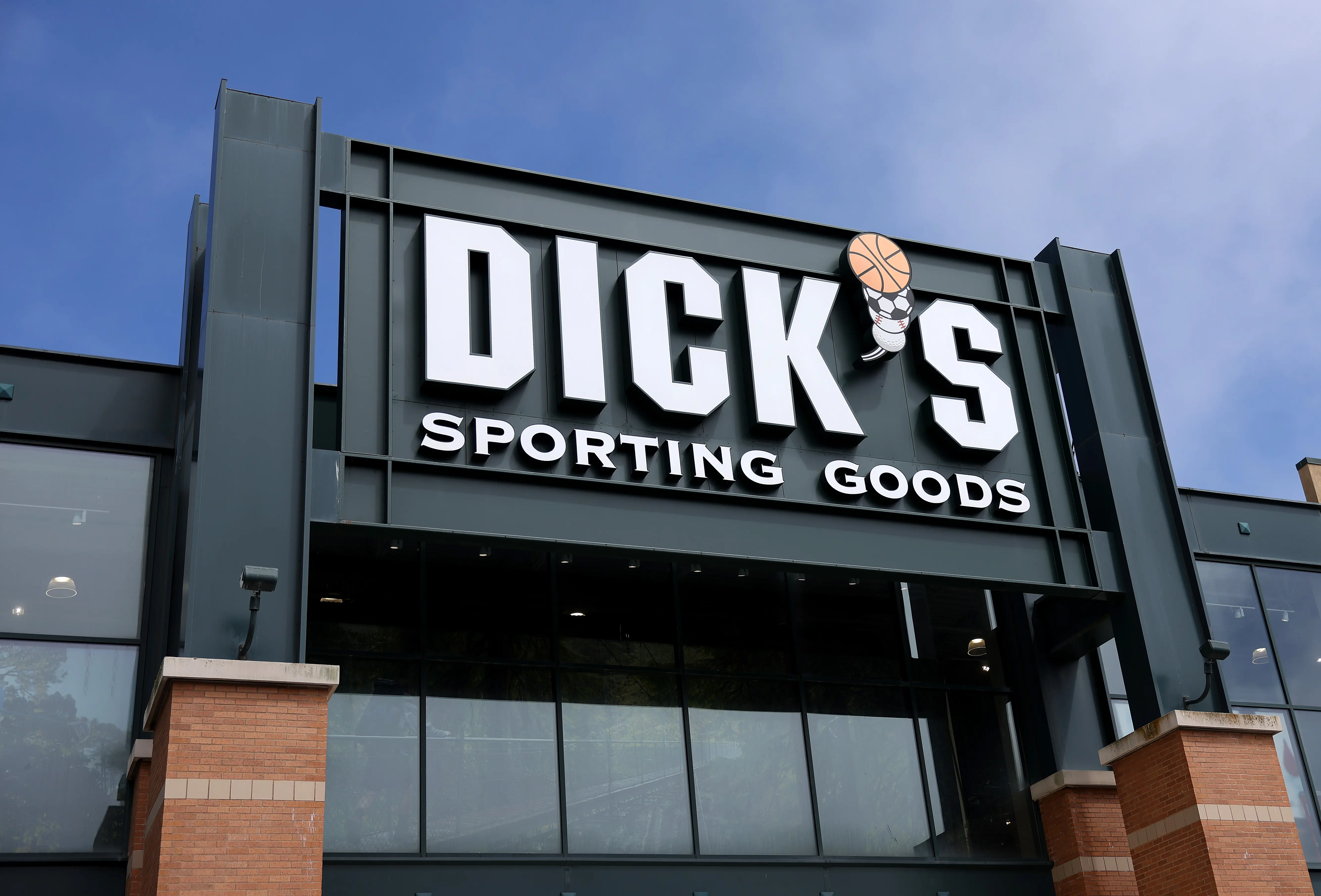 A sign is posted in front of a Dick's Sporting Goods store on September 04, 2024 in Daly City, California. (Photo by Justin Sullivan/Getty Images)