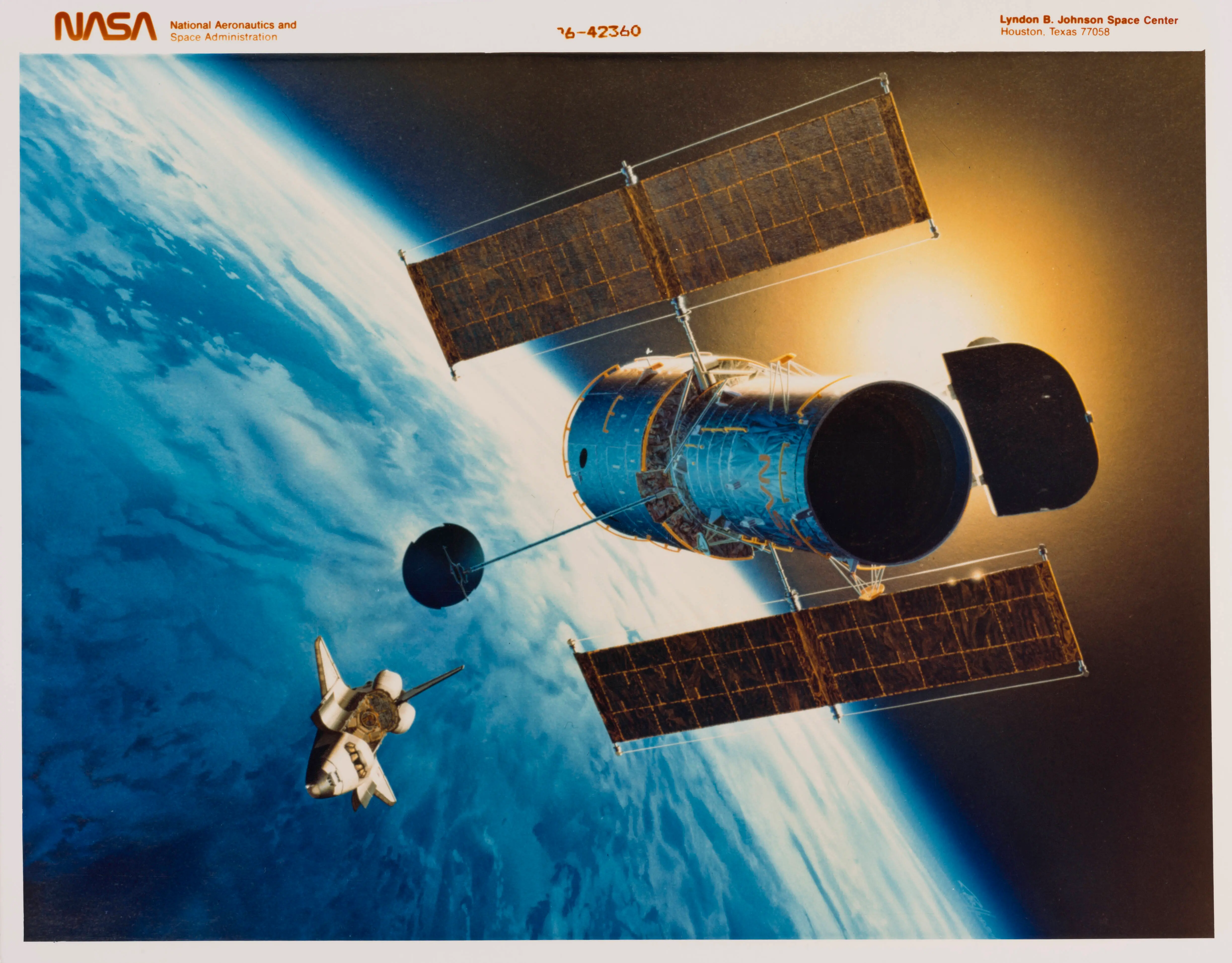 An artist's concept of a NASA space telescope with a Shuttle Orbiter in the vicinity (Photo for reference, Image via Getty)