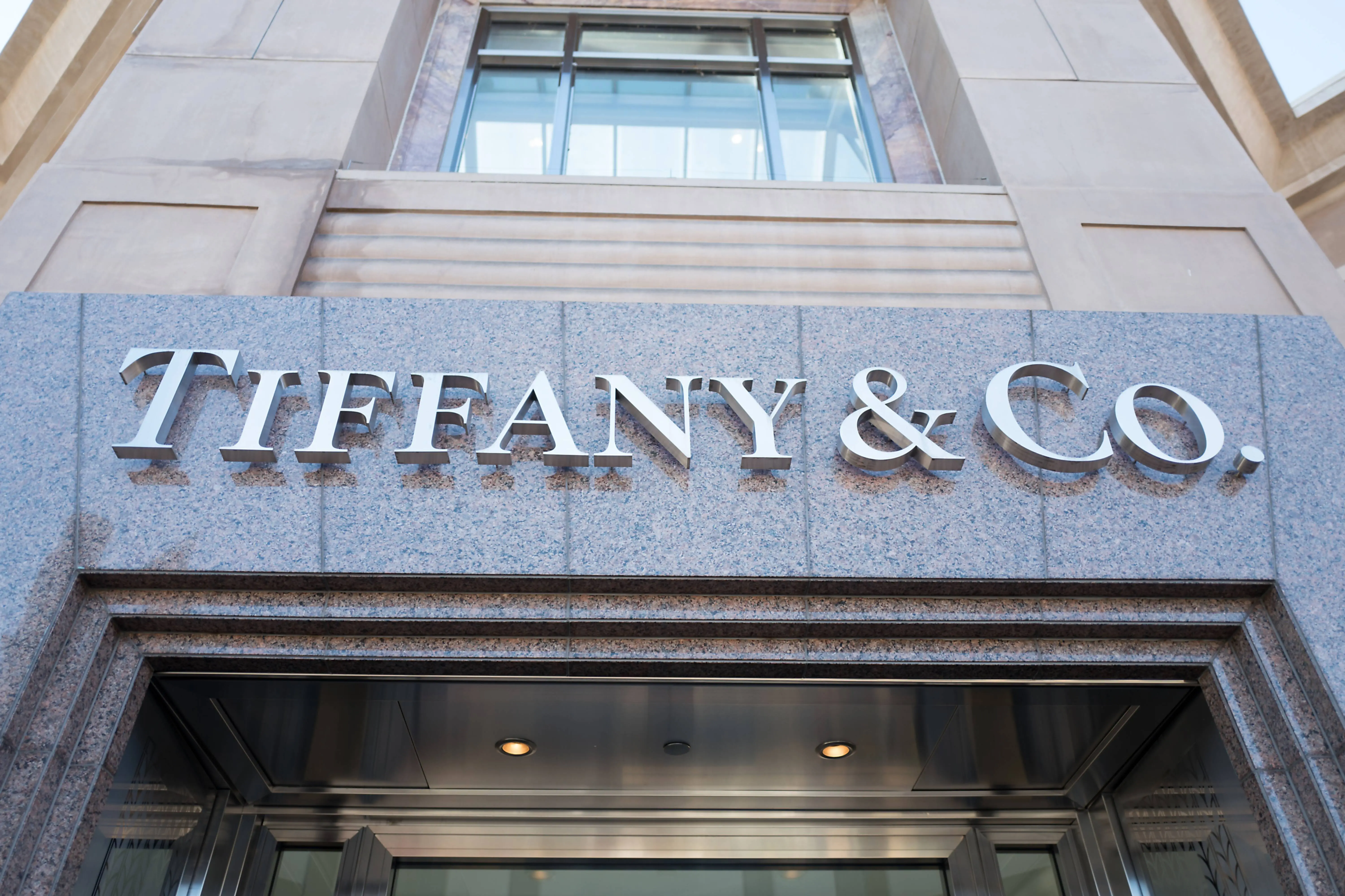 Close-up of sign above entryway on facade of the Tiffany and Co luxury jewelry store in downtown Walnut Creek, California, November 17, 2017. (Photo by Smith Collection/Gado/Getty Images)