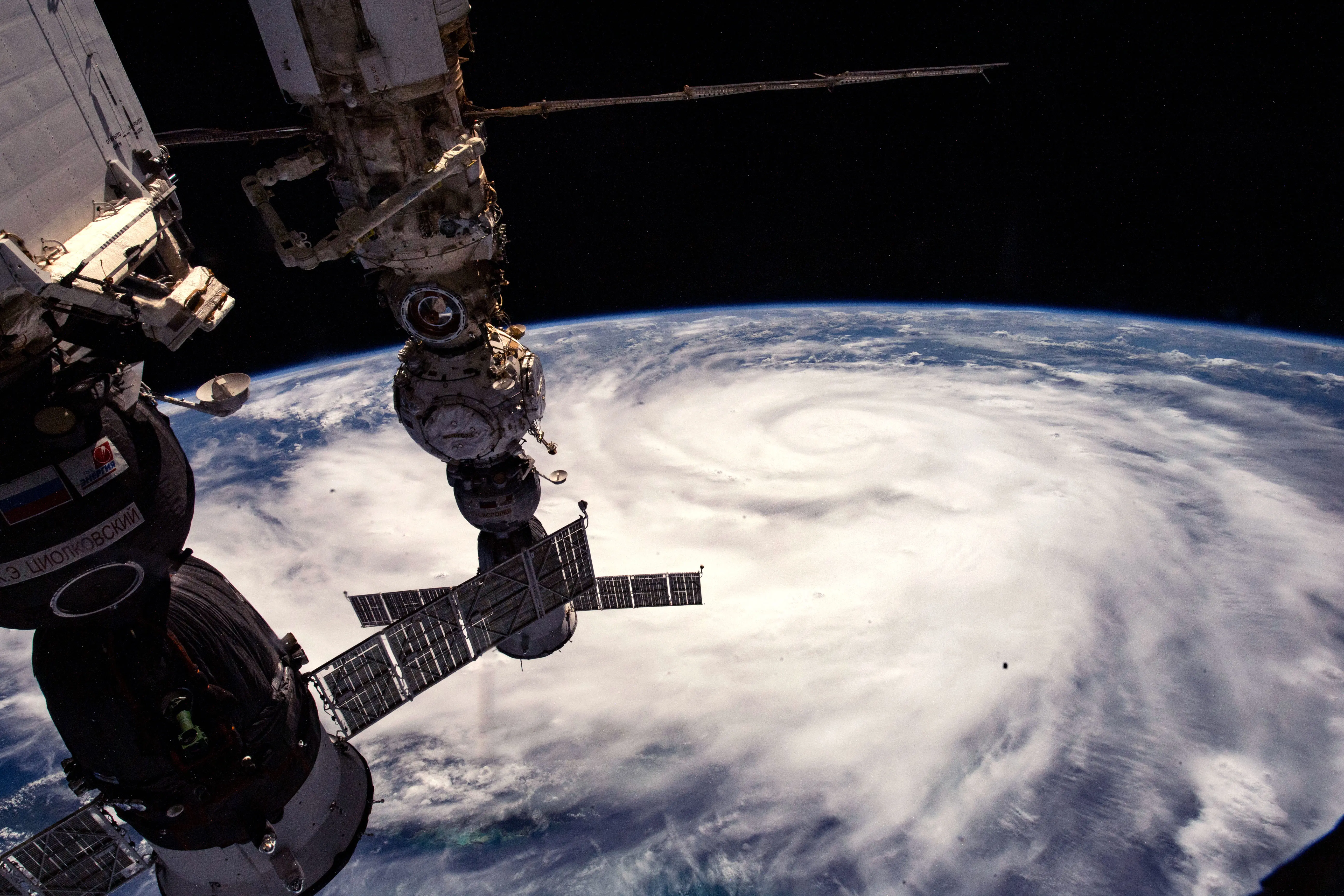 In this NASA handout image taken from the International Space Station, Hurricane Ian moves through the Caribbean Sea on September 26, 2022 just south of Cuba. The storm is expected to bring a potentially life-threatening storm surge and hurricane-force winds (Image via Getty)
