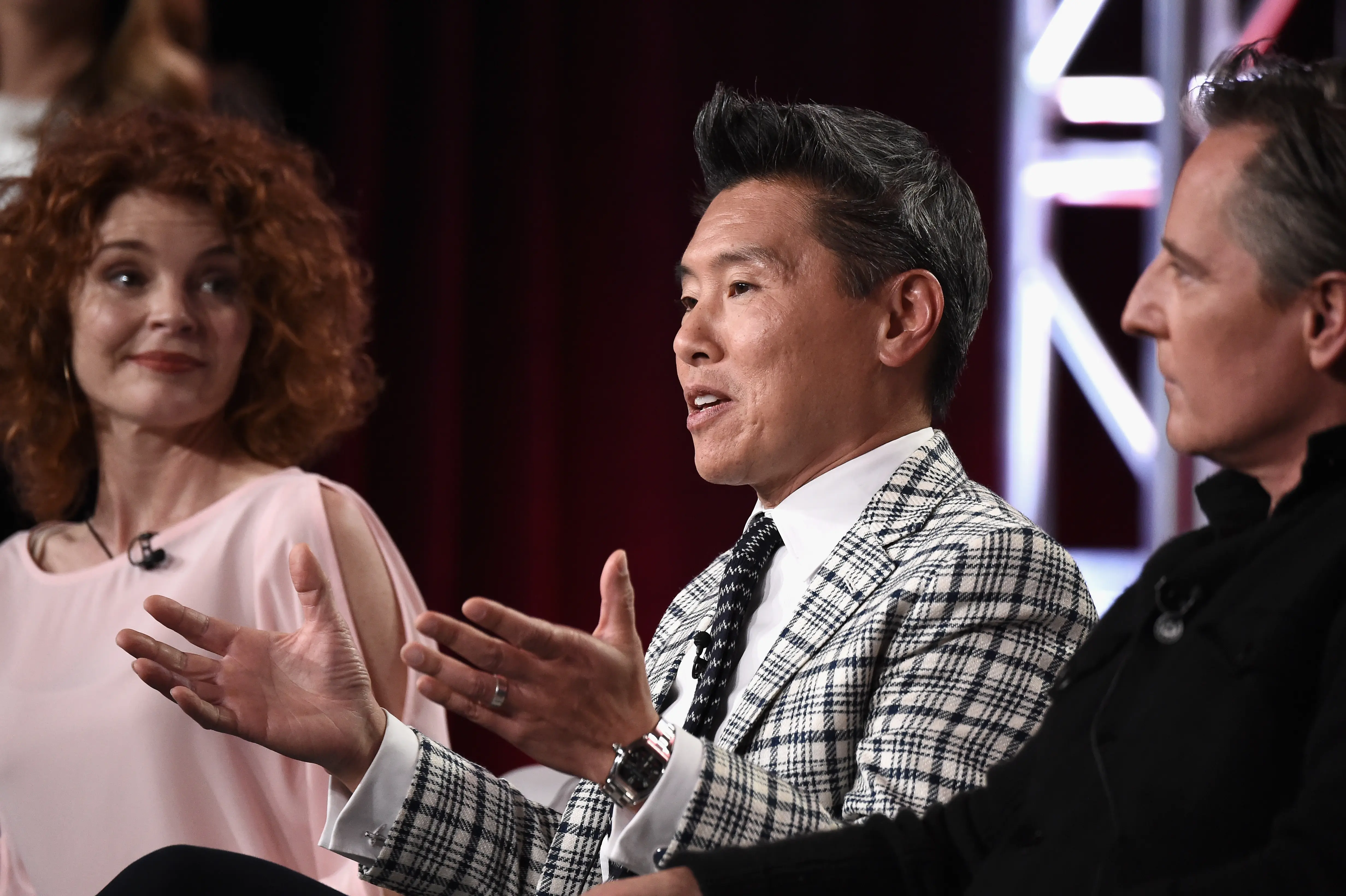 Home Reimagined star interior designer Vern Yip (In the middle). (Photo by Amanda Edwards/Getty Images for Discovery )