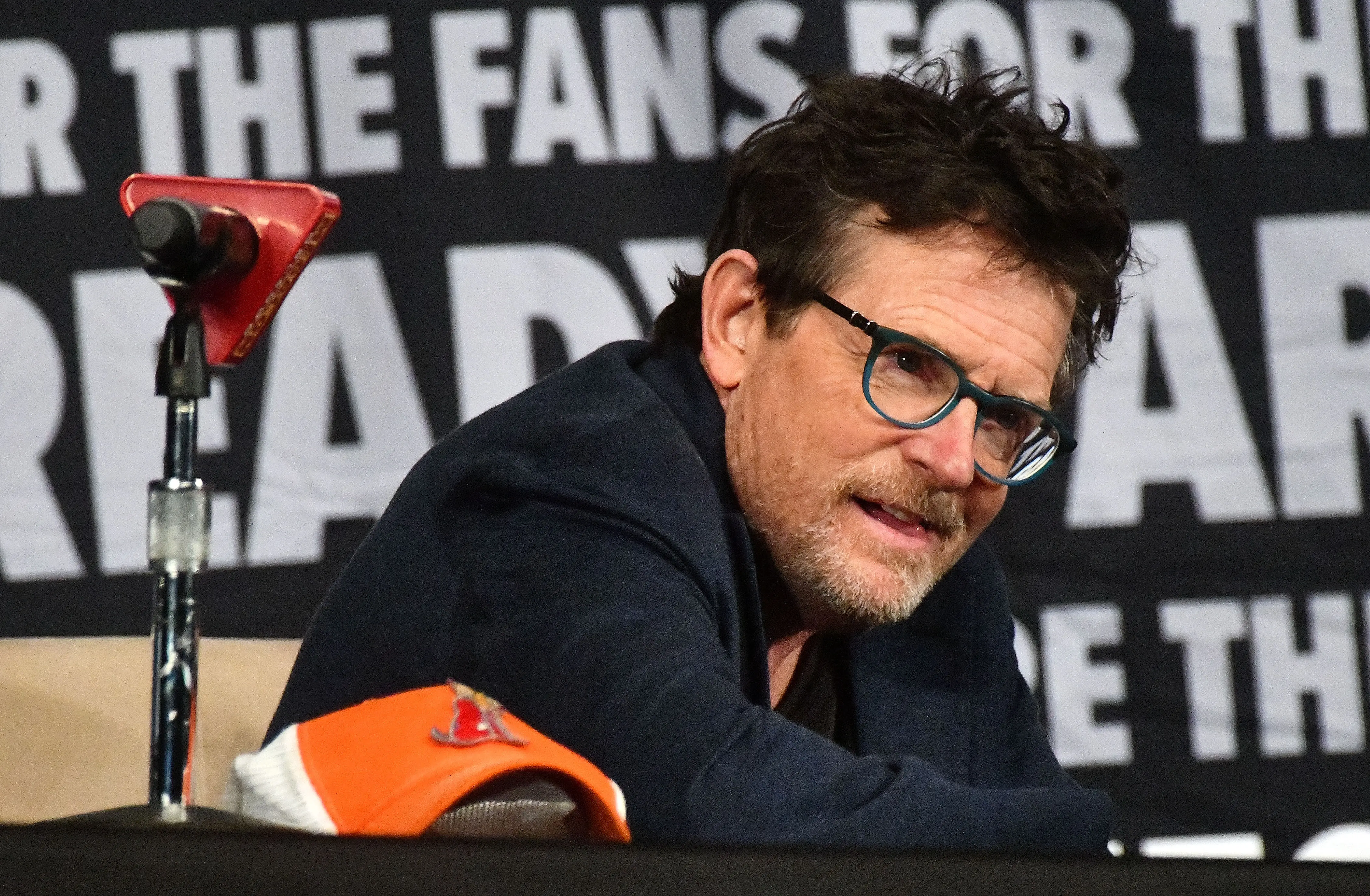 ORLANDO, FLORIDA - FEBRUARY 01: Actor Michael J. Fox smiles during the ‘Back to the Future’ reunion at MegaCon Orlando 2024 at Orange County Convention Center on February 01, 2024 in Orlando, Florida. (Photo by Gerardo Mora/Getty Images)