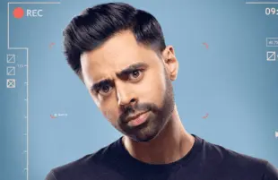Hasan Minhaj in a promotional image for Patriot Act with Hasan Minhaj (Netflix)