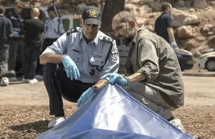 Tzahi Grad and Shlomi Elkabetz play a police office and a counter-terrorism agent investigating the murder at the heart of Our Boys. (PHOTO: RAN MENDELSON/HBO