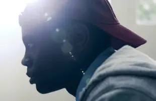 David (Akili McDowell) in a promotional photo for David Makes Man. (OWN)