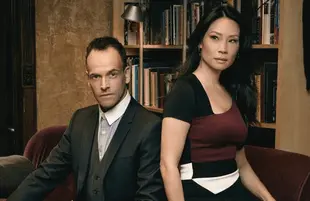 Jonny Lee Miller and Lucy Liu in Elementary (CBS)