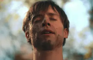 David Rysdahl in a reenactment of author Jeff Sharlet's experience inside The Fellowship, the secretive Christian organization that is the focus of Netflix's The Family.
