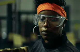 Shawnlea, a former GM worker, was making $30 a hour. At Fuyao, she's paid $12.84 an hour. (Netflix)