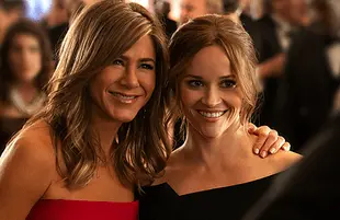 Jennifer Aniston and Reese Witherspoon in a rare moment together in The Morning Show. (Photo: Apple TV+)
