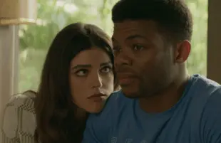 Nellie (Callie Hernandez) wonders what Sam (Paul James) is thinking. Cue the music! (Netflix)