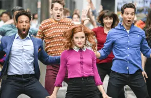 John Clarence Stewart, Jane Levy and Skylar Astin shake a leg in Zoey's Extraordinary Playlist. (Photo: NBC)