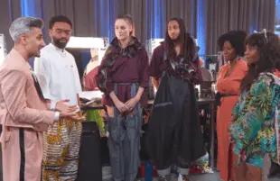 Tan France and Kerby Jean-Raymond critique Farai Simoyi-Agbede and KiKi Peterson in Next in Fashion. (Netflix)