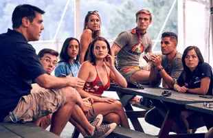 Camp owner David Schreiber with staff members Gary Kidd, Randall Klein, Neely Fortune, Sophia D'Angelo, Glen North, Adam Mizrahi, Claire Sorrels in Camp Getaway. (Photo: Karolina Wojtasik/Bravo)