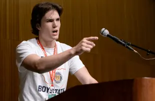 Texas Boys State gubernatorial candidate Robert MacDougall makes a campaign speech in Boys State. (Photo: Apple TV+) 