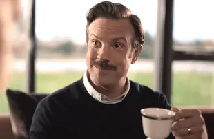 Who doesn't enjoy a spot of tea in jolly old England? Fish out of water Ted Lasso (Jason Sudeikis), that's who. (Photo: Apple TV+)