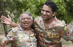 Ravi Patel (right), travels to Mexico with his father Vasant in the first episode of  Ravi Patel's Pursuit of Happiness. (HBO Max)