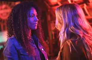 Kylie Bunbury and Katheryn Winnick, not practicing social distancing or face masking, in Big Sky. (ABC)