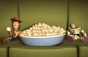 Woody and Buzz Lightyear enjoy Pixar popcorn. Will you? (Photo: Pixar/Disney)