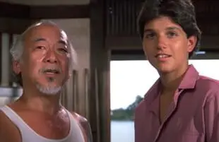 Pat Morita and Ralph Macchio in The Karate Kid Part II